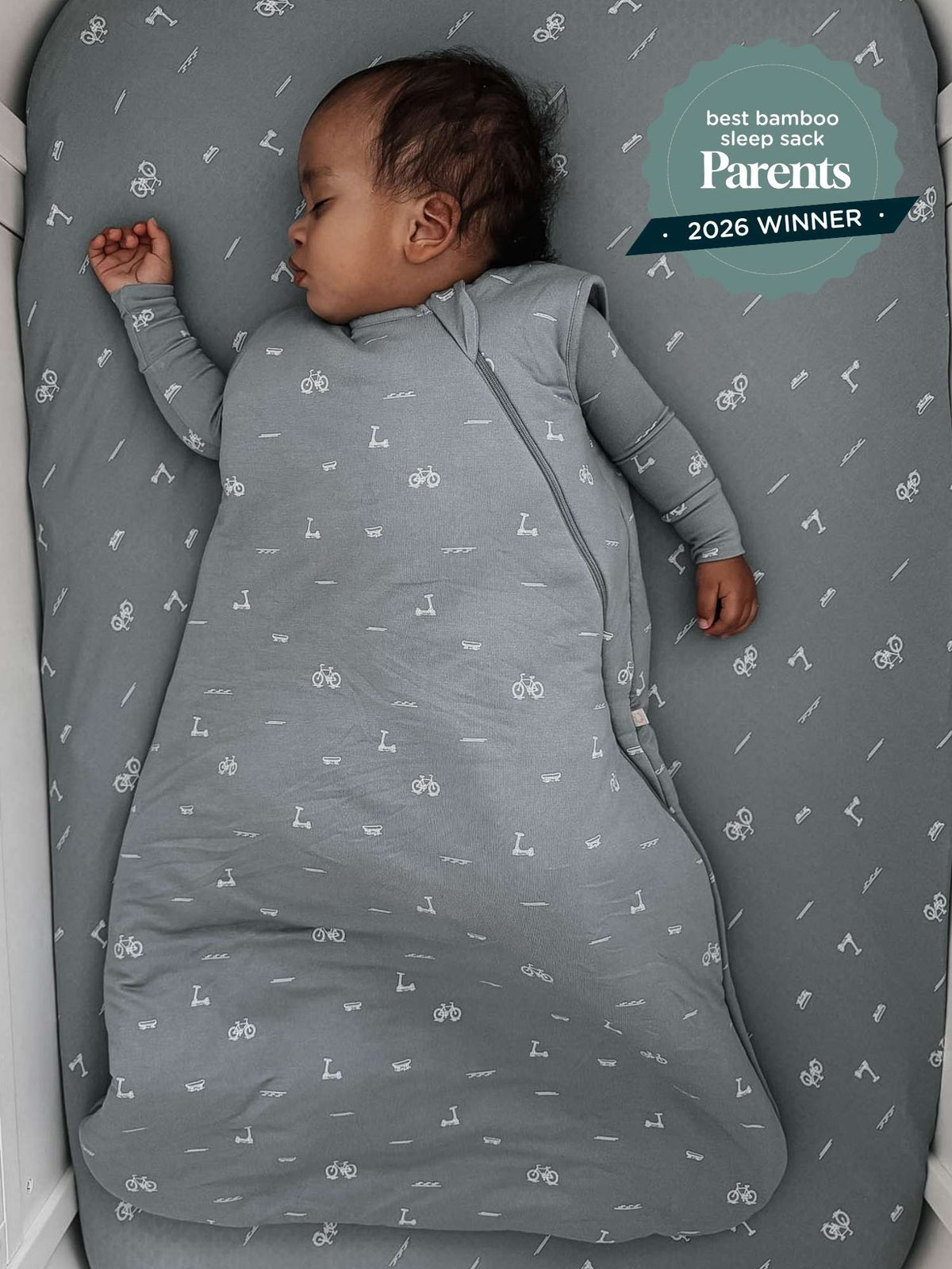 Grey baby sleep sack on bedding, long sleeves, zipper, dash icon print