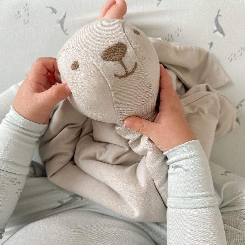 Bunny lovey comfort blanket with plush bunny face and long ears, light beige