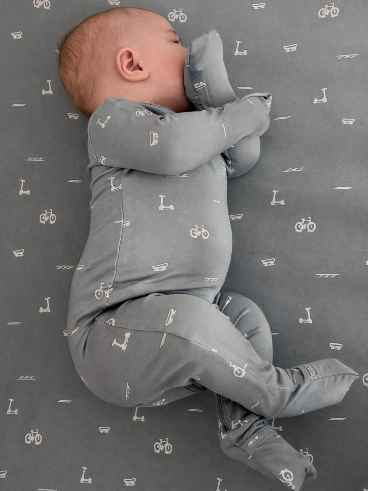 Gray convertible pajamas with all-over Dash icon print; folded cuffs and long sleeves