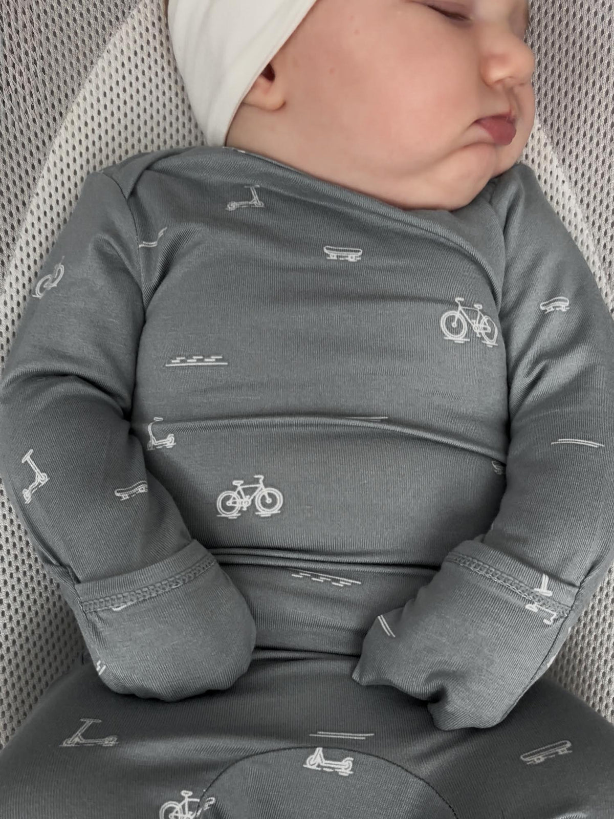 Gray convertible pajamas with Dash icon print; long sleeves and foldover hand covers