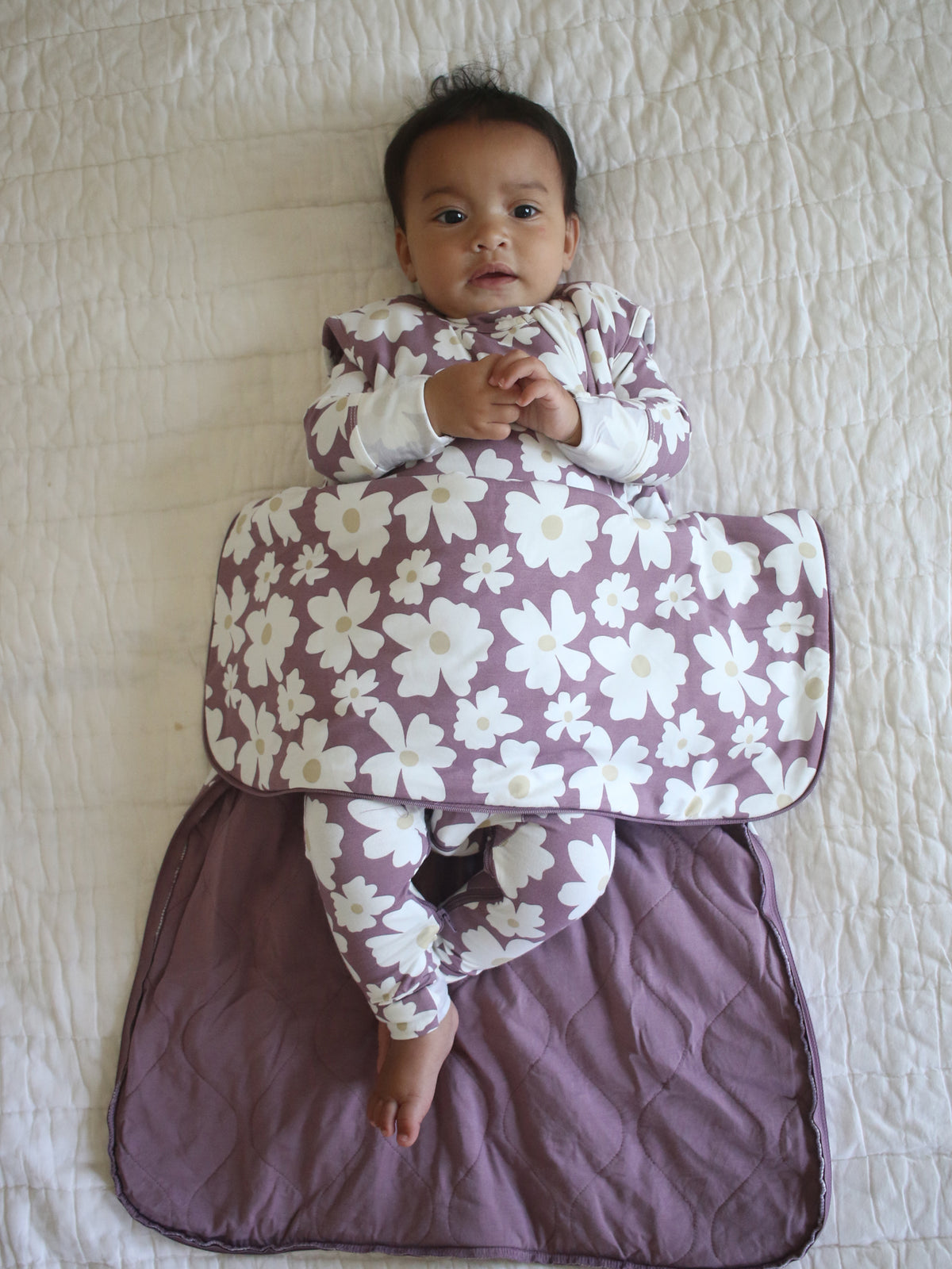Floral sleep sack with maroon and white flower pattern, zip front and long sleeves