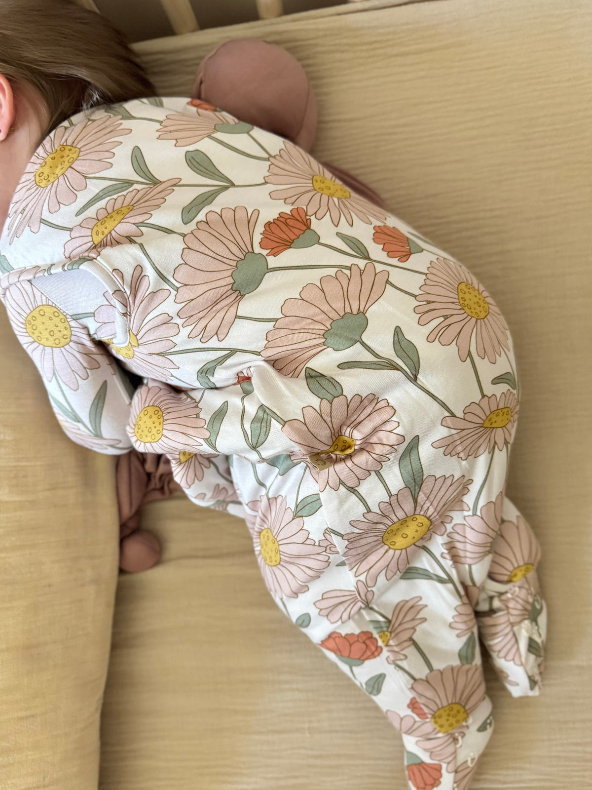 Floral footie sleep sack with long sleeves and footed design, cream with pastel prints