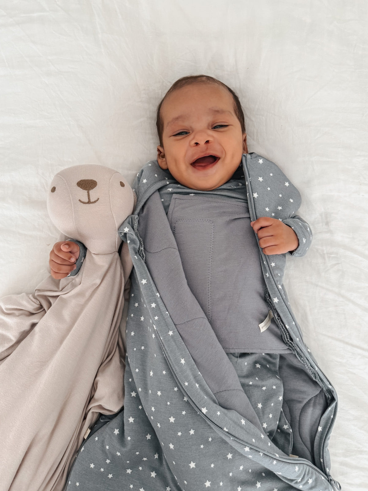 2.5 TOG swaddle sleep sack in gray with white stars, zipped swaddle