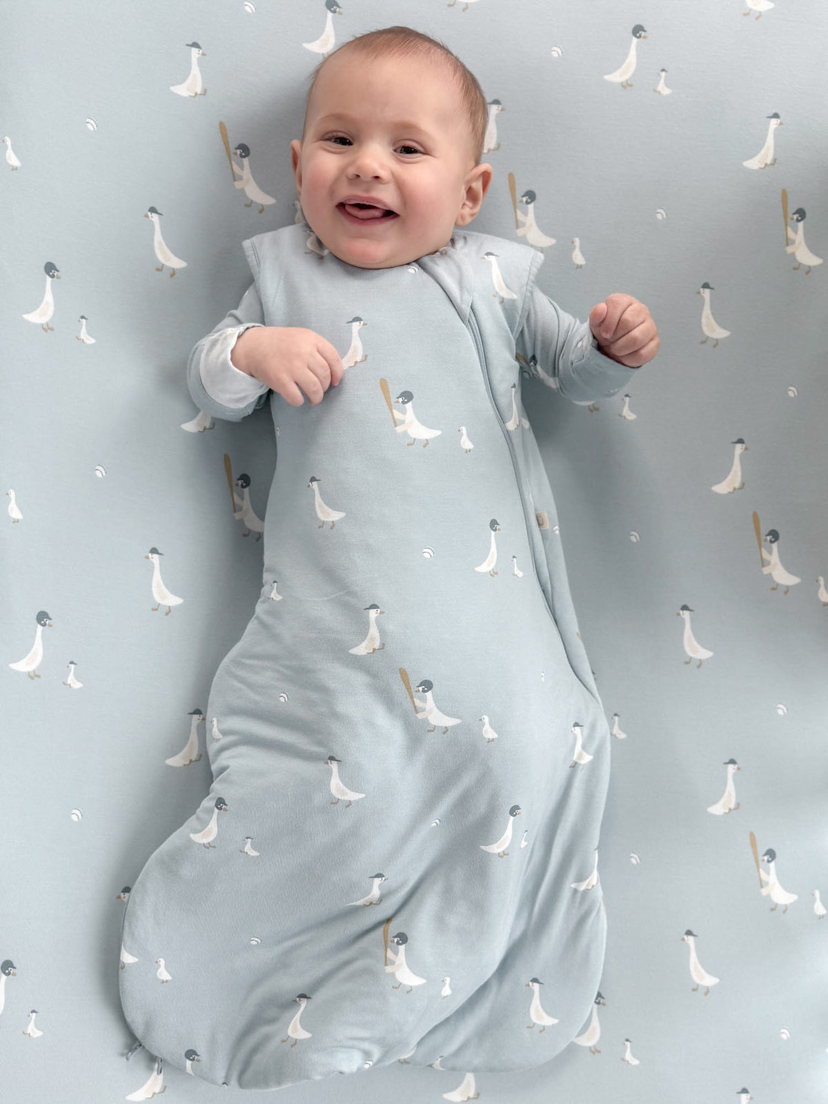 Light blue goose-print swaddle sleep sack, zip front, long sleeves, 1.0 TOG