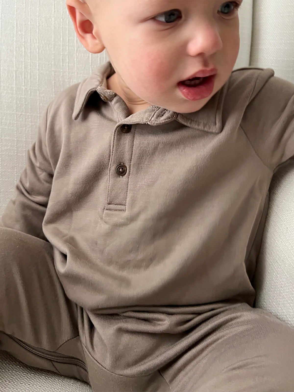 Taupe fleece collared jumpsuit with button placket and long sleeves