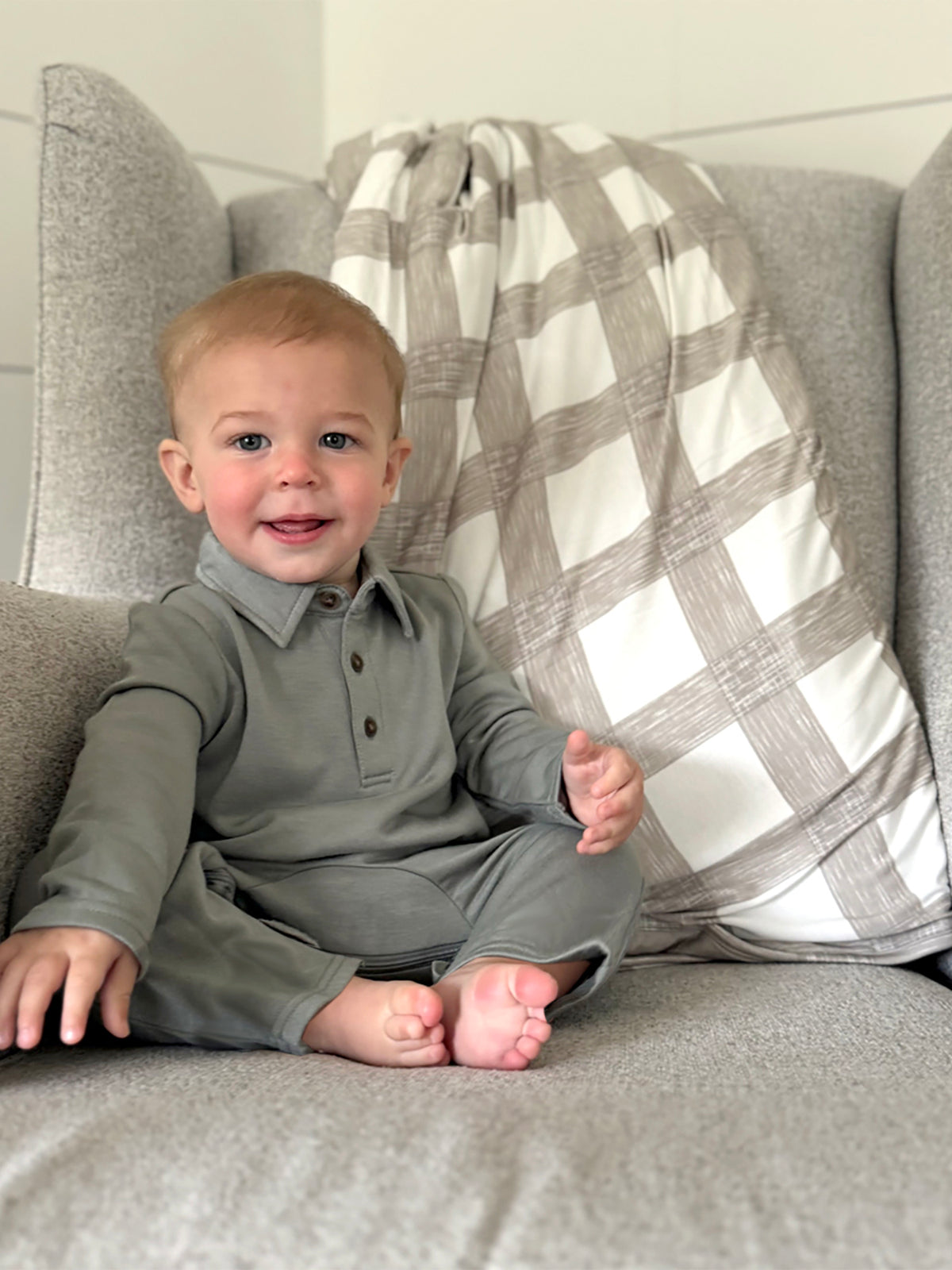 Sage green fleece collared jumpsuit with button placket and long pant legs