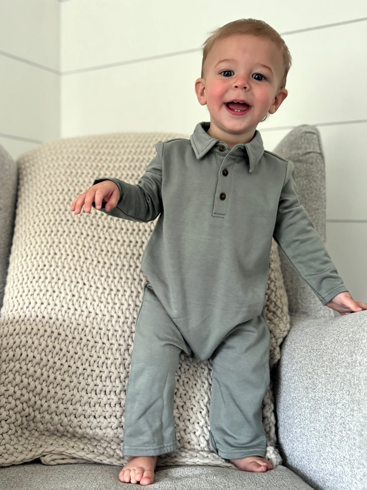 Sage green fleece collared jumpsuit for baby, button-front and long sleeves