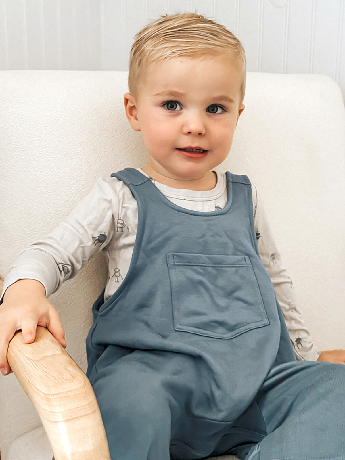 Teal fleece baby overalls with bib front pocket and short legs