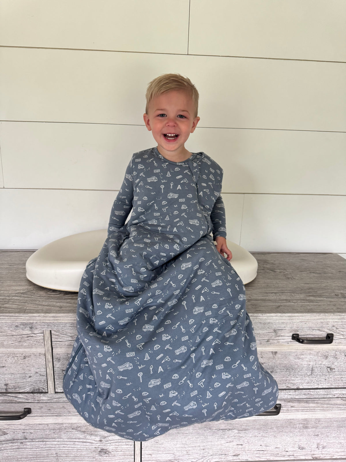 Blue construction print sleep sack, 1.0 TOG, full-body bag with fitted arms