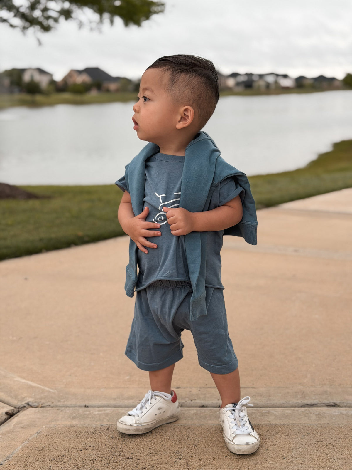 Boys' blue bike graphic T-shirt and matching shorts set, toddler side view