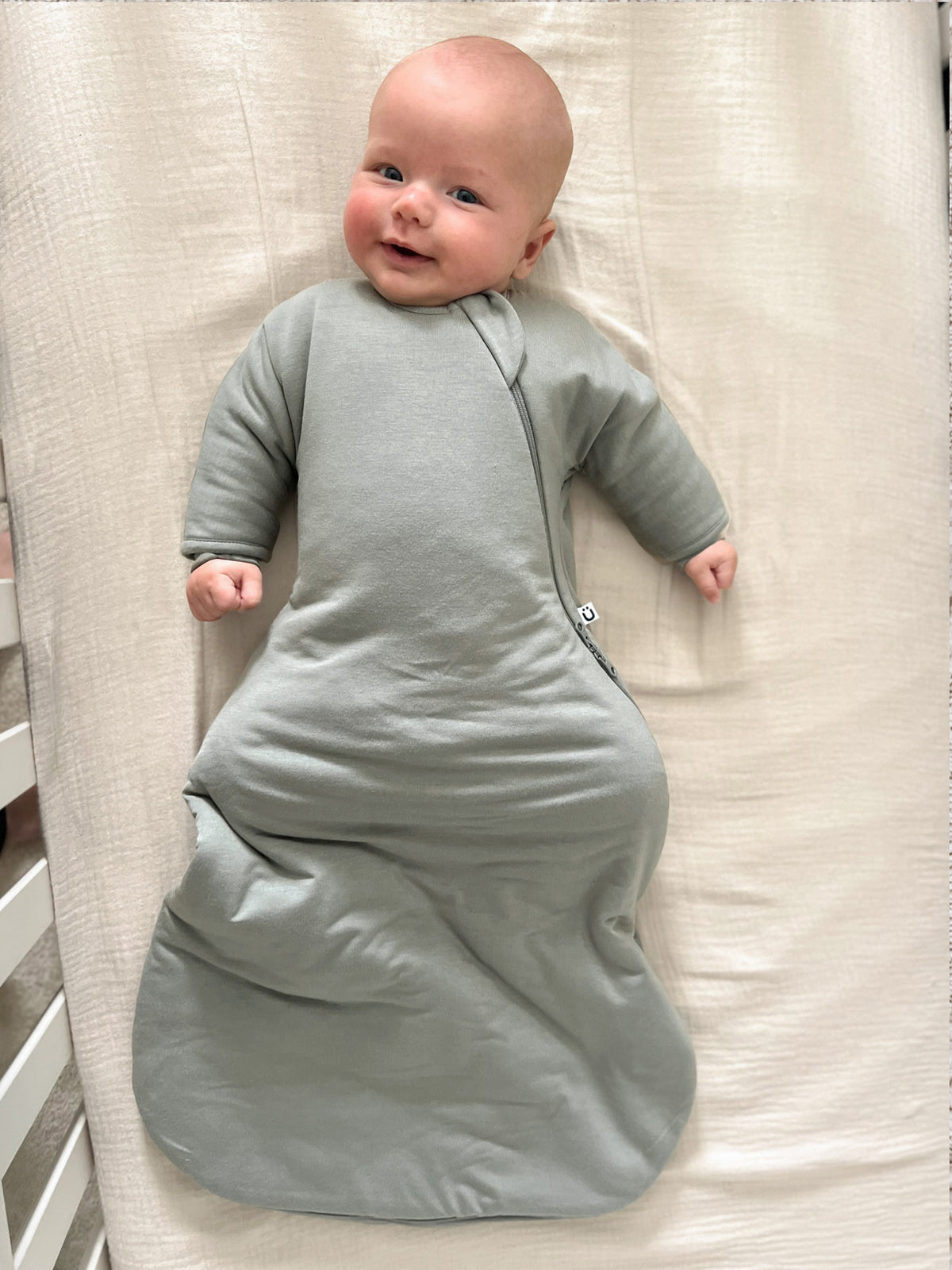 Sage green long sleeve transitional swaddle sack with full front zip