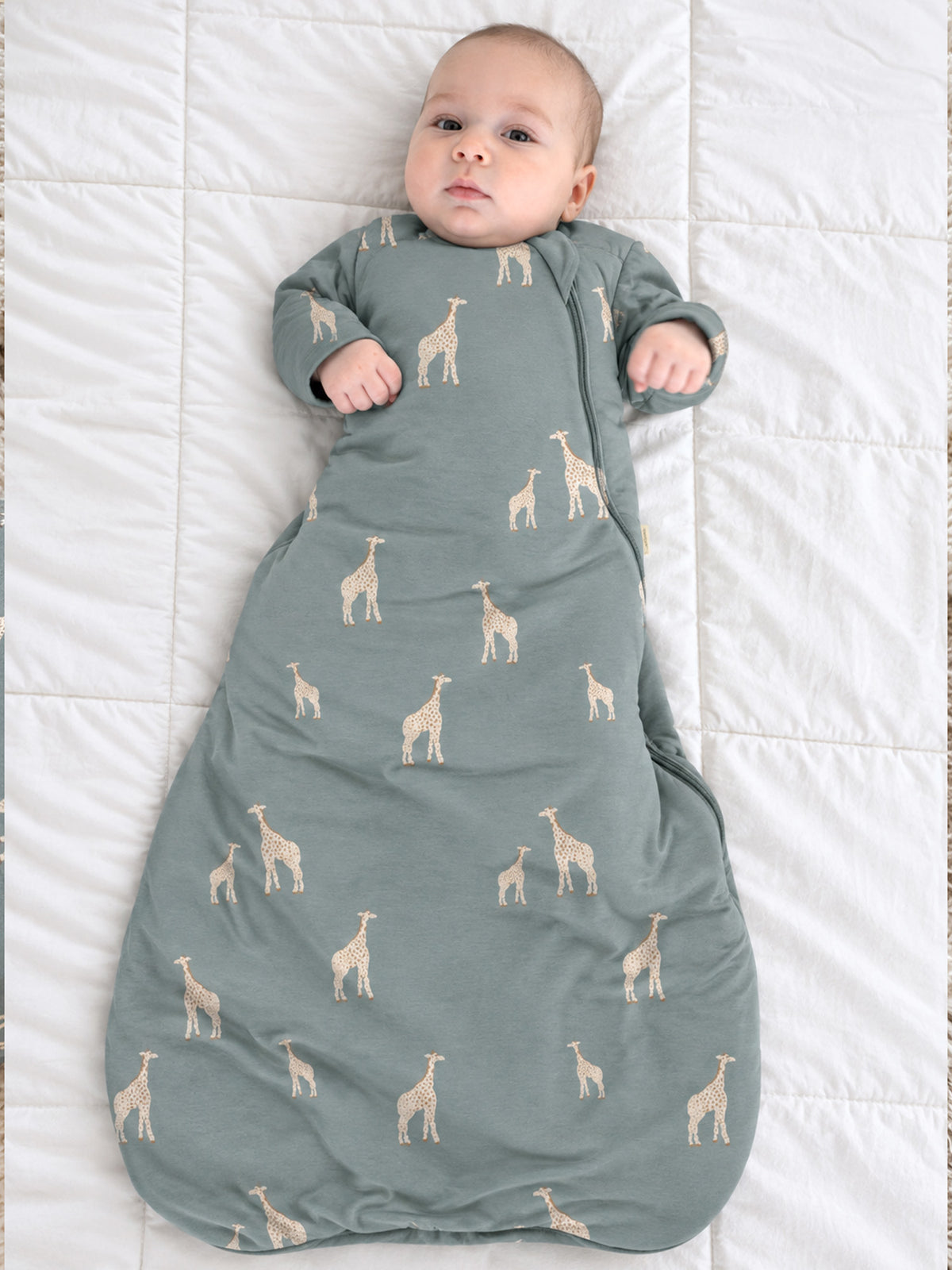 Baby long-sleeve swaddle sleep sack in moss green with beige giraffe print