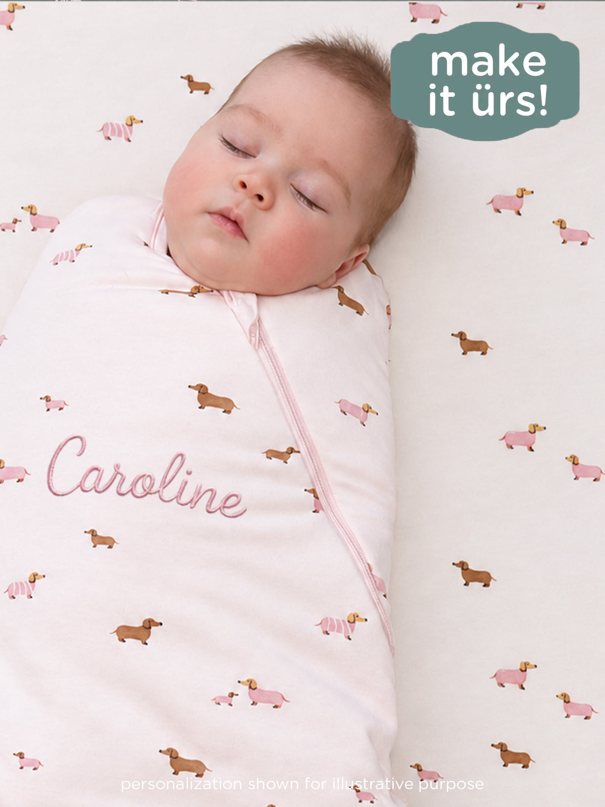 Dog-print swaddle sleep sack with pink front zipper and soft hooded wrap for baby