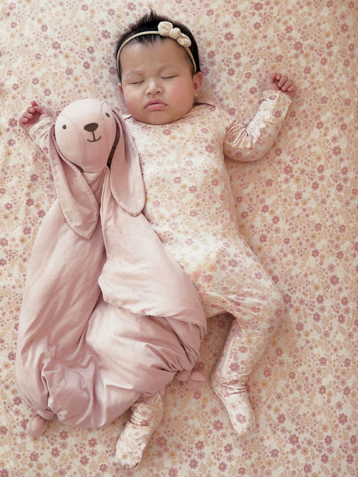 Floral convertible pajama set with long sleeves and matching footed pants in sorbet pink