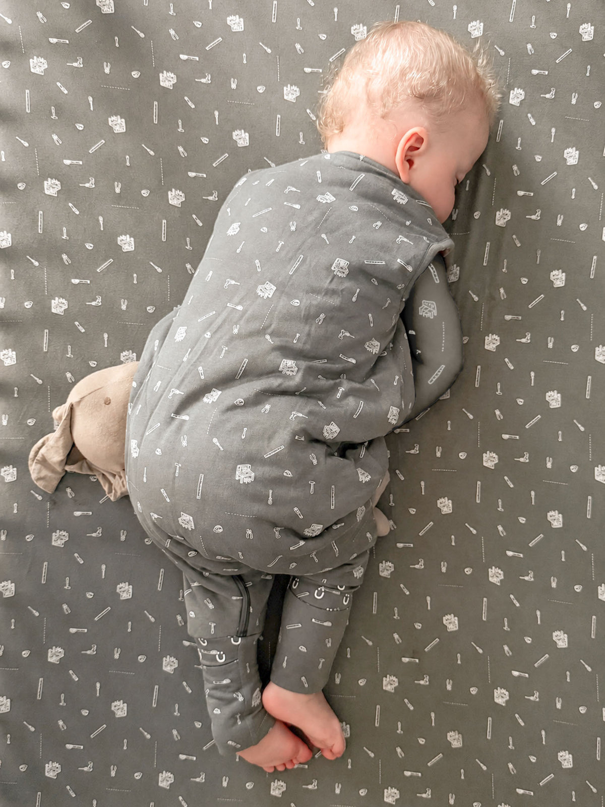 Gray footie sleep sack with small tools print, zip front, covered feet