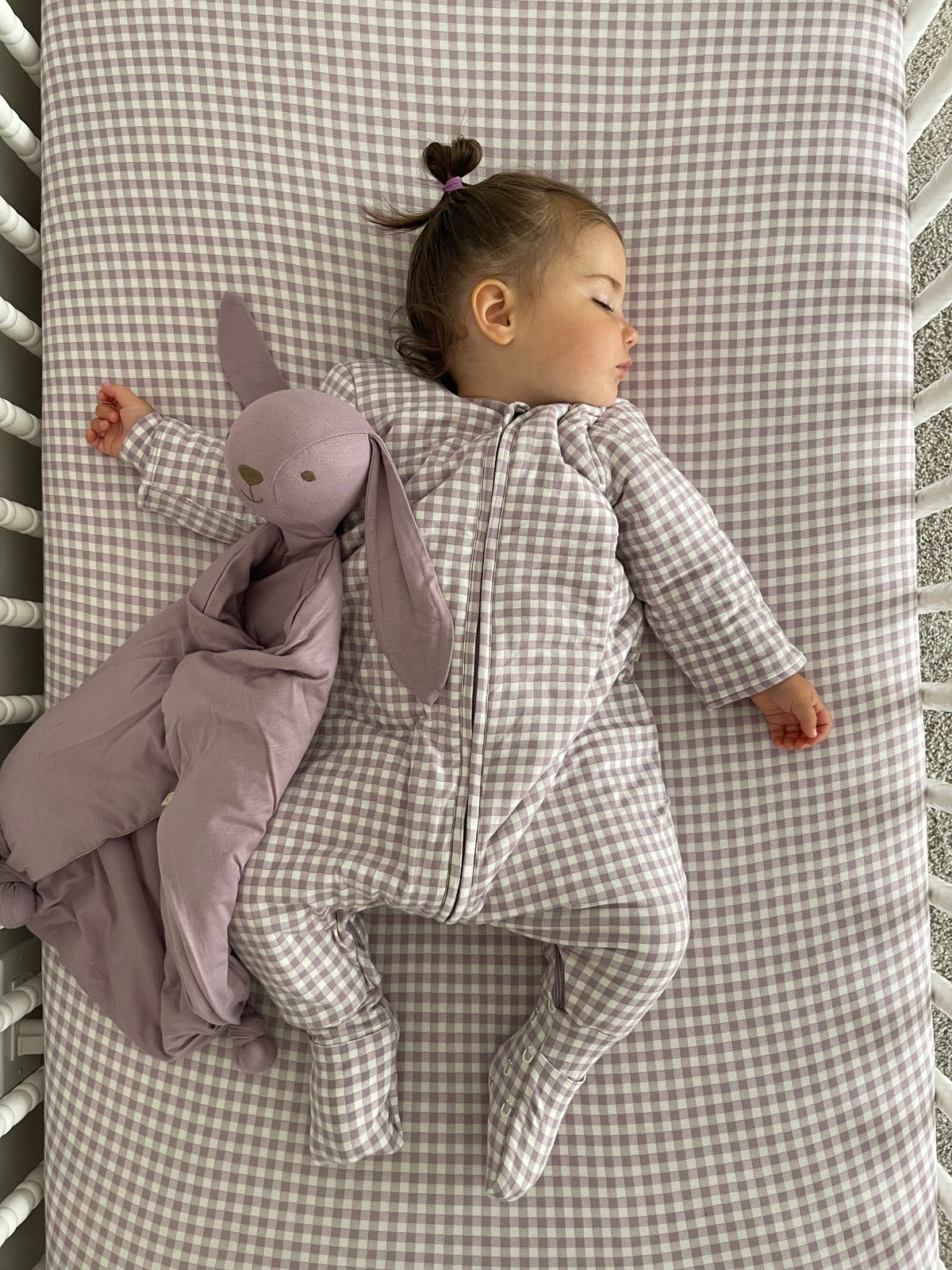 Infant long-sleeve footed sleep sack, gray-and-white check pattern, front zipper