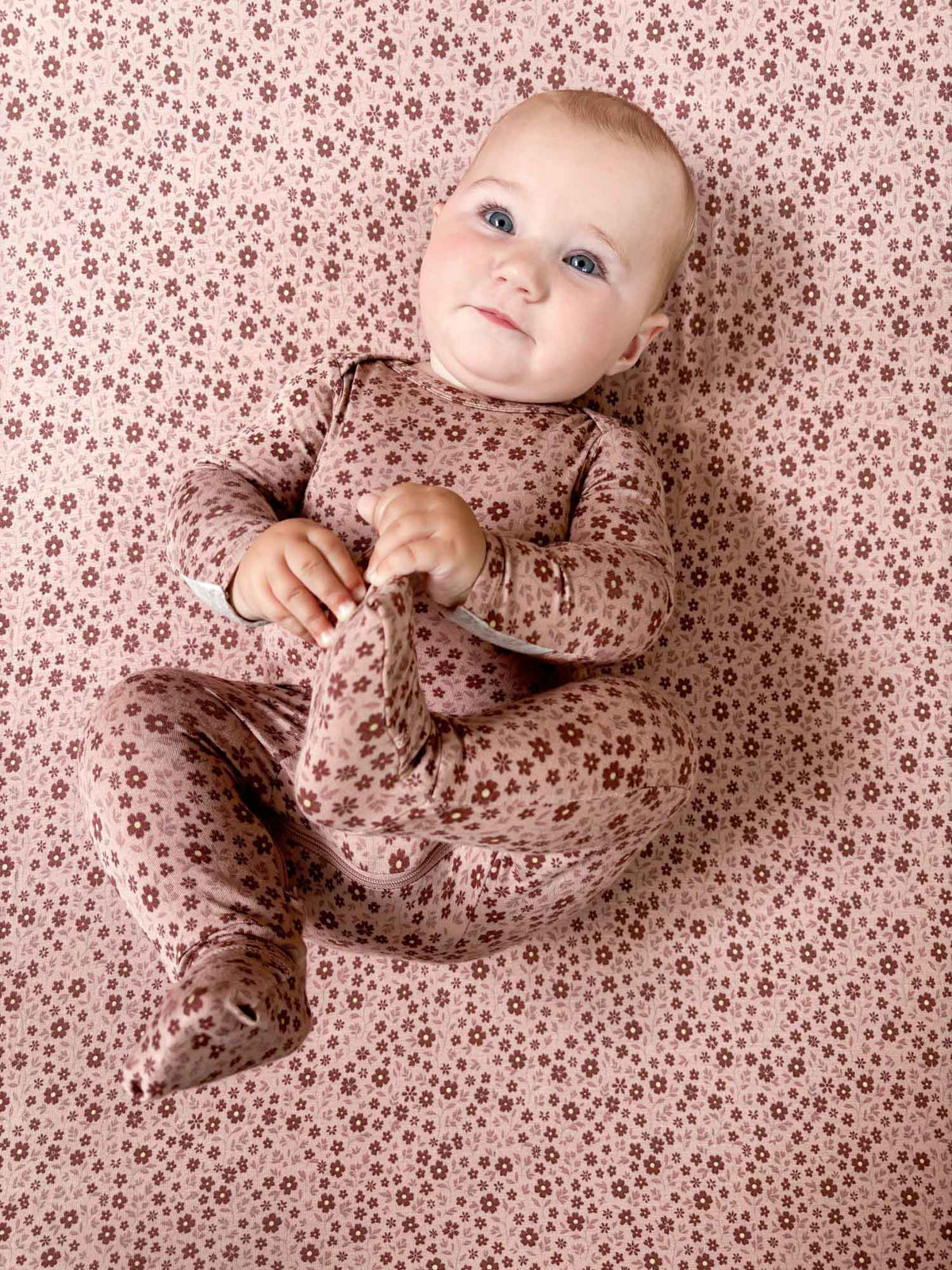 Petal floral convertible pajama romper with long sleeves and zipper, dusty rose print