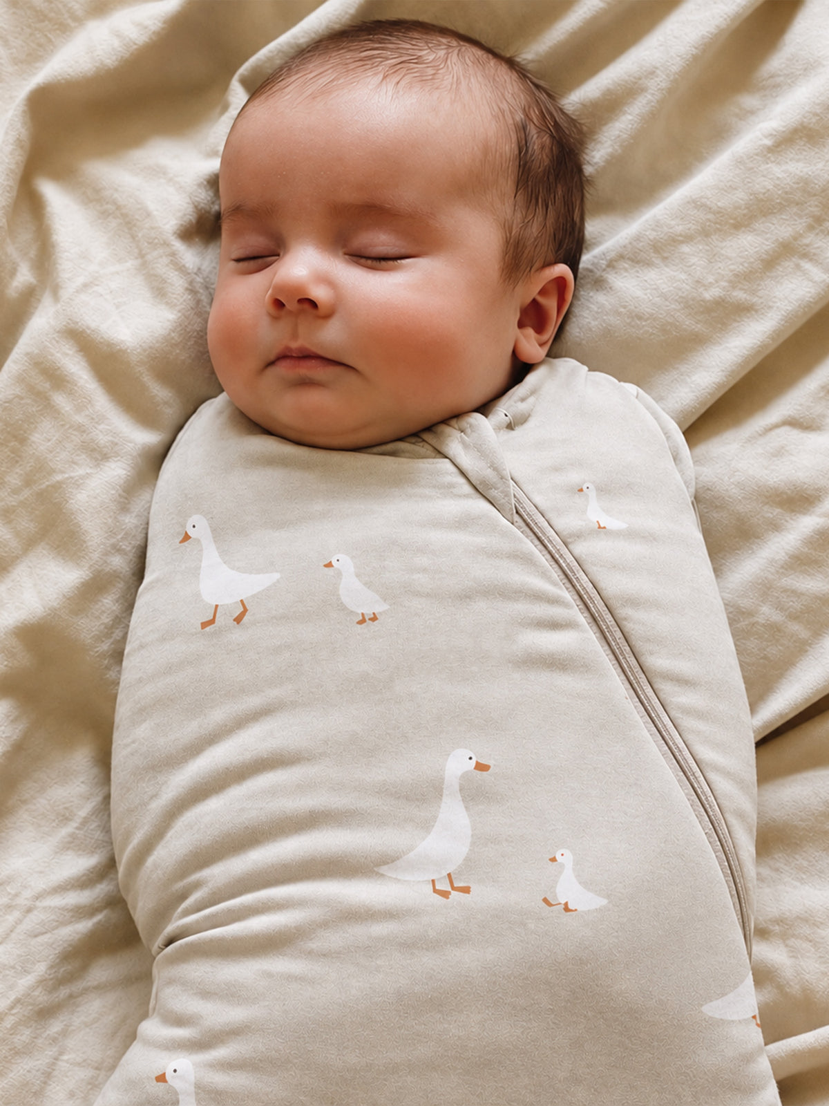 2.5 TOG swaddle sleep sack with goose print, front zipper, cream