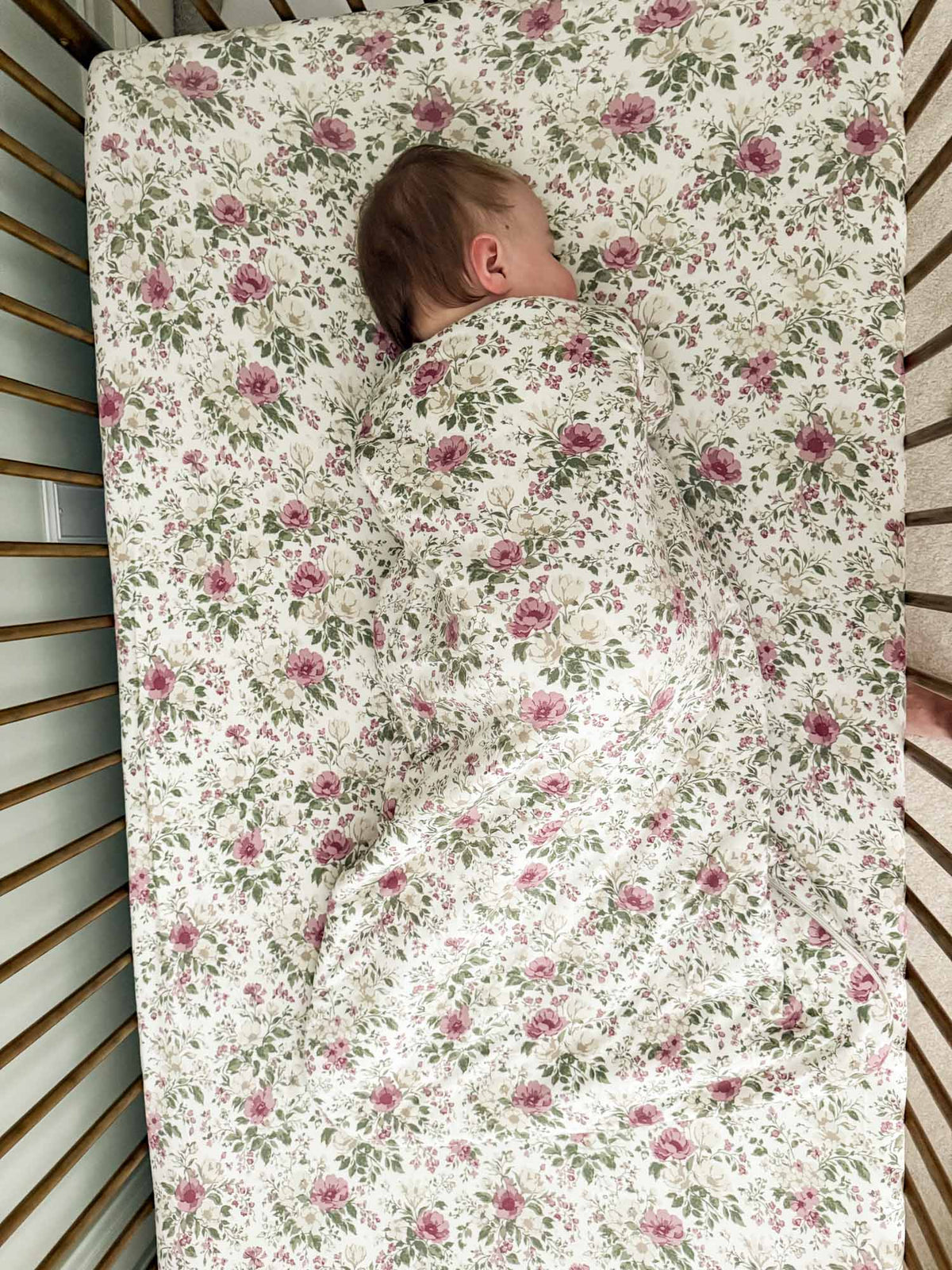 Baby sleep sack, cream with mauve floral pattern, footed wrap style, 2.5 TOG