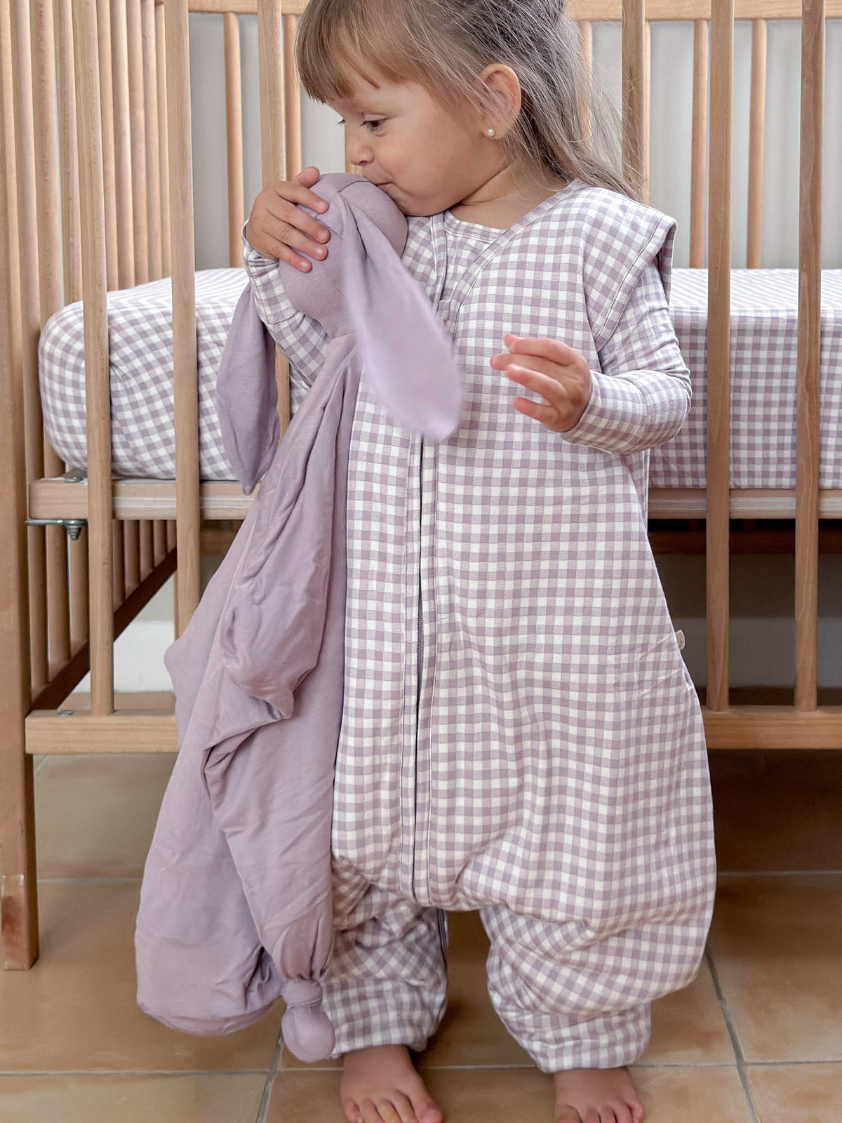 Light taupe gingham footie sleep sack with full-length zipper and foot openings