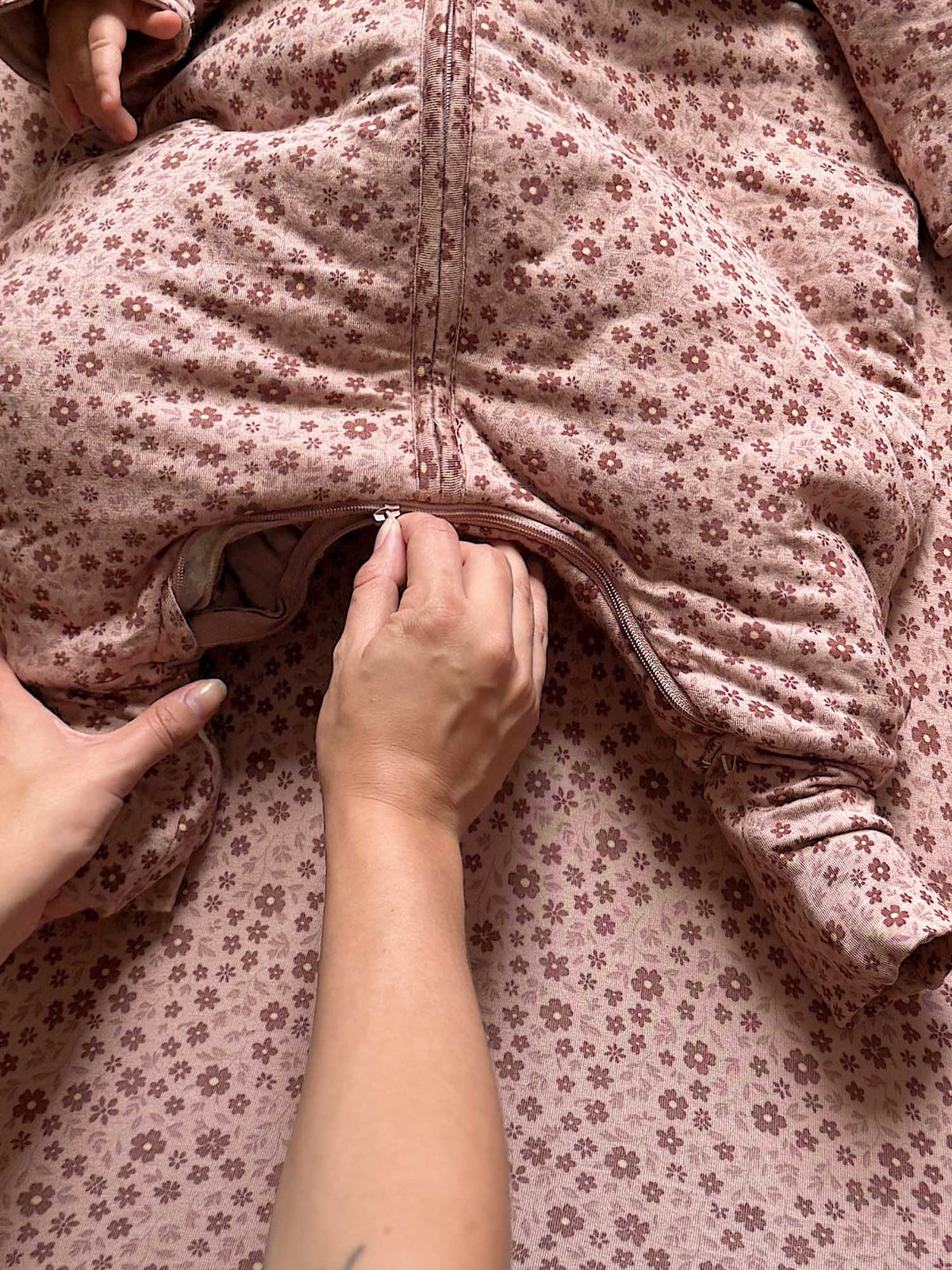Heart-print sleep sack footed legs with open zipper and soft fabric lining