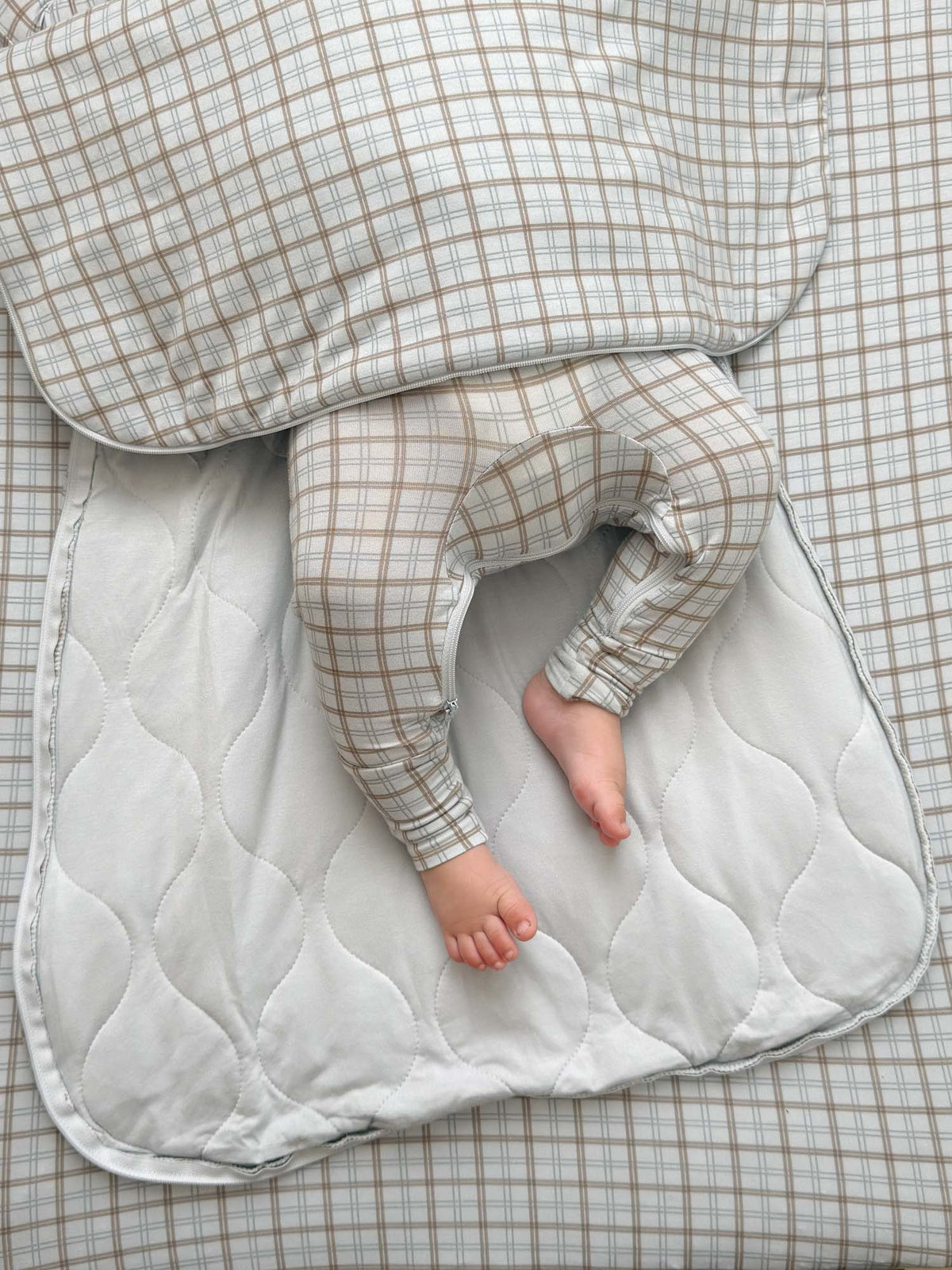Plaid sleep sack (2.5 TOG) showing quilted foot area and light gray grid