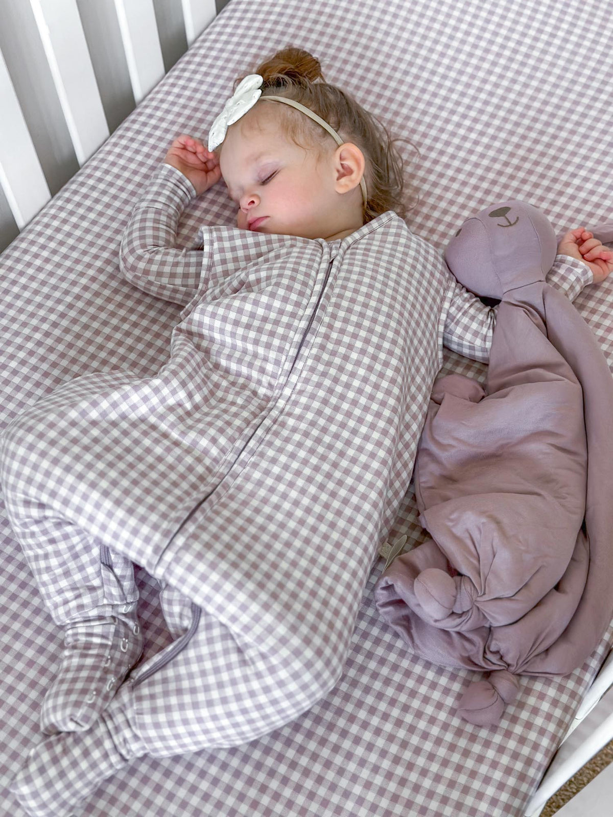Gingham footed baby sleep sack with front zipper and attached foot coverings