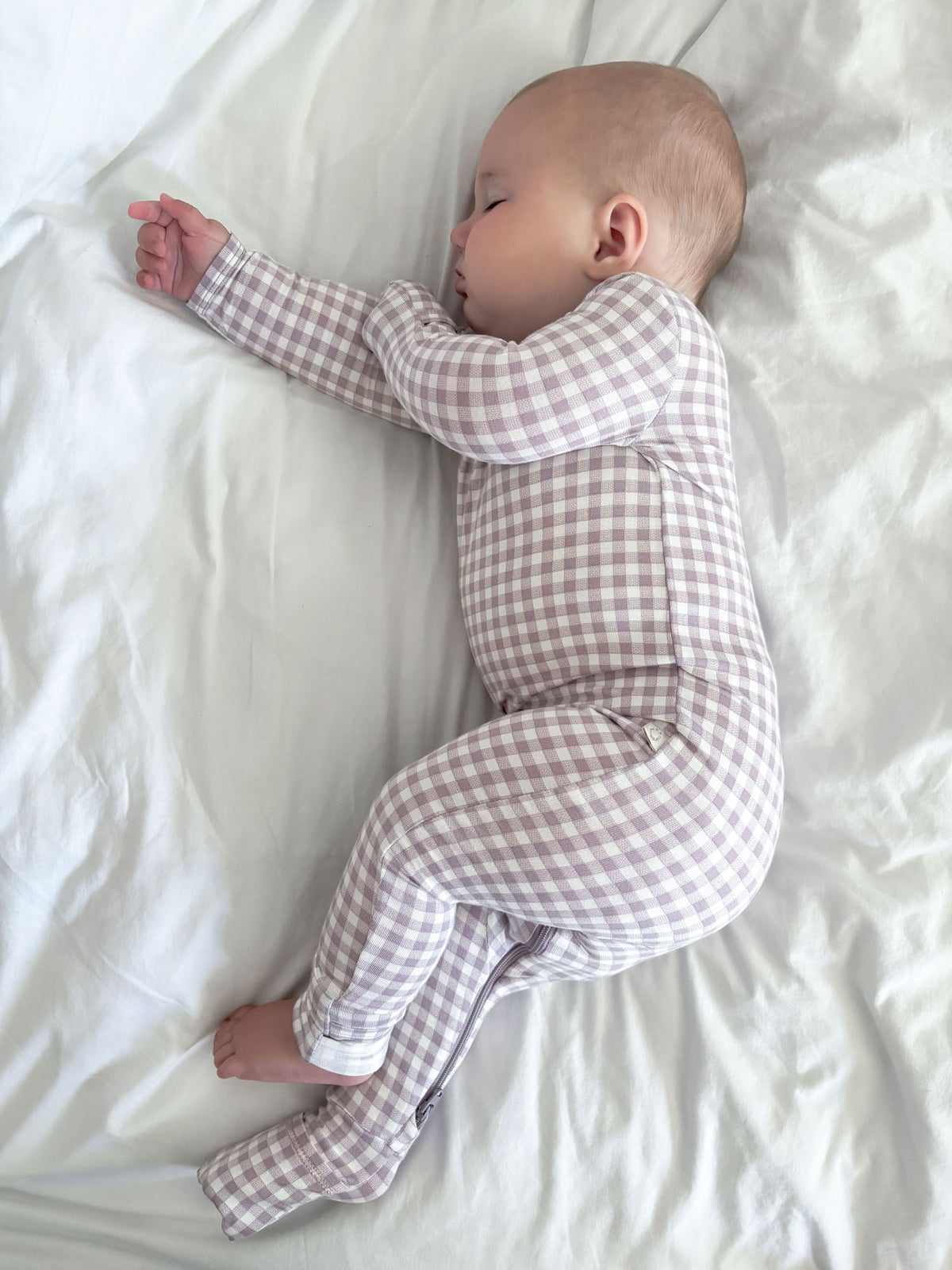 Gingham plaid baby pajama one-piece, long sleeves and tucked legs