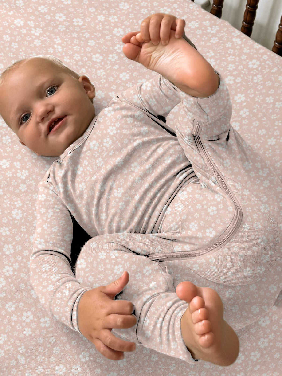 Pink floral convertible pajama sleeper with zip front and mitten-style cuffs