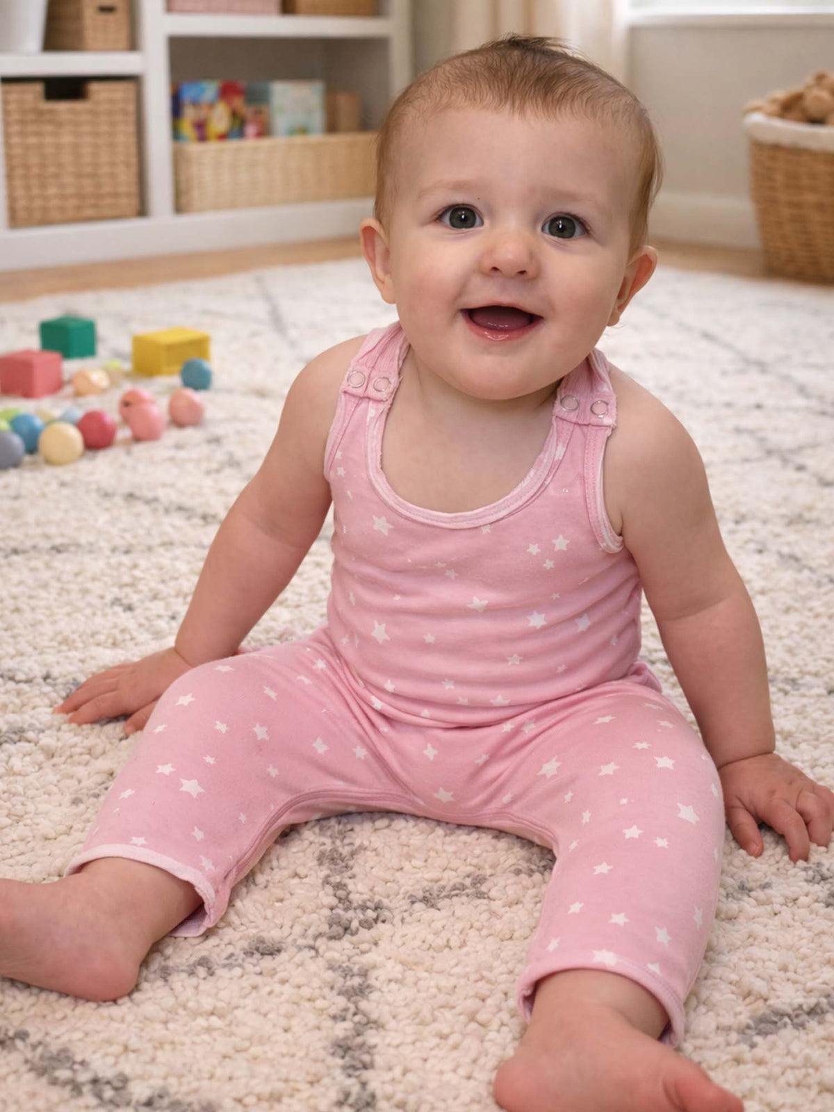 Pink star print tank romper with sleeveless bodysuit fit