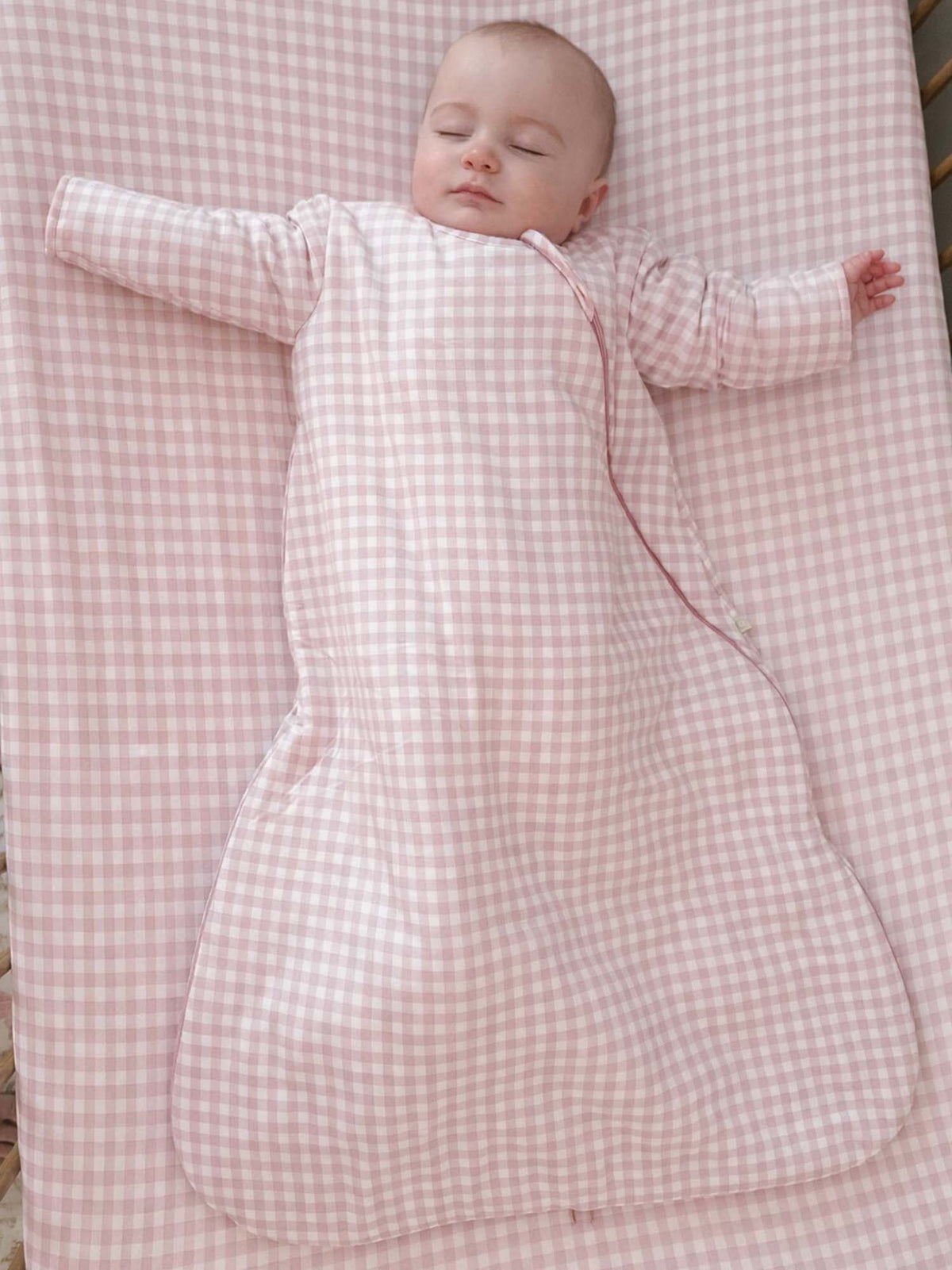 Pink gingham long-sleeve sleep sack, full body coverage with zipper and arm openings
