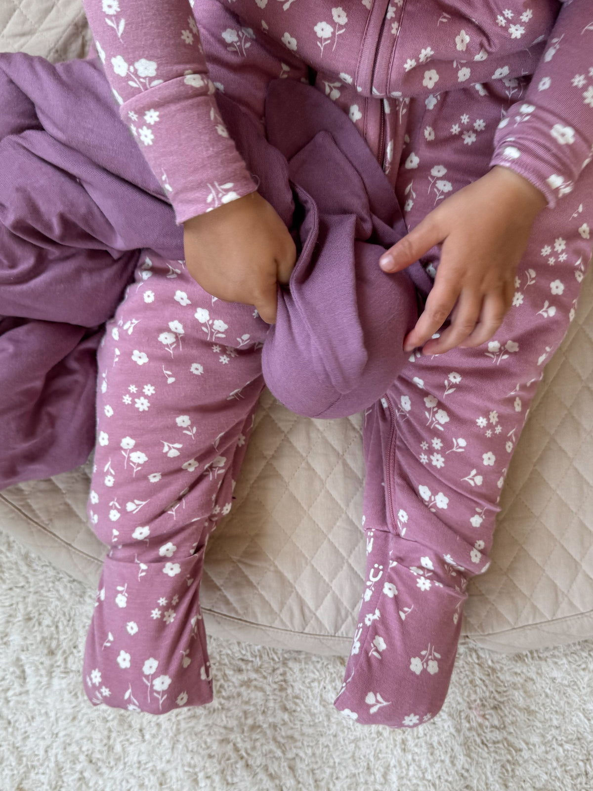 Floral footed sleep sack with front zipper, mauve-purple and white mini flowers