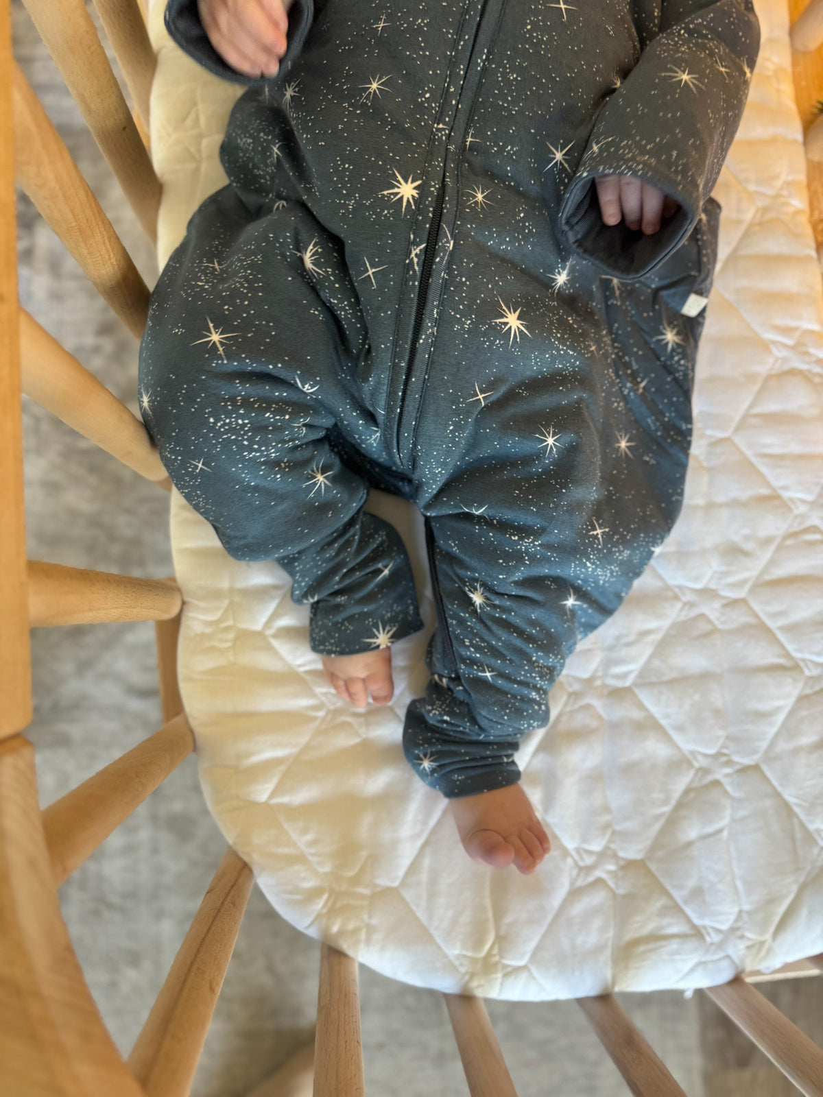 Dark blue star-print long sleeve footie sleep sack with full-length front zipper