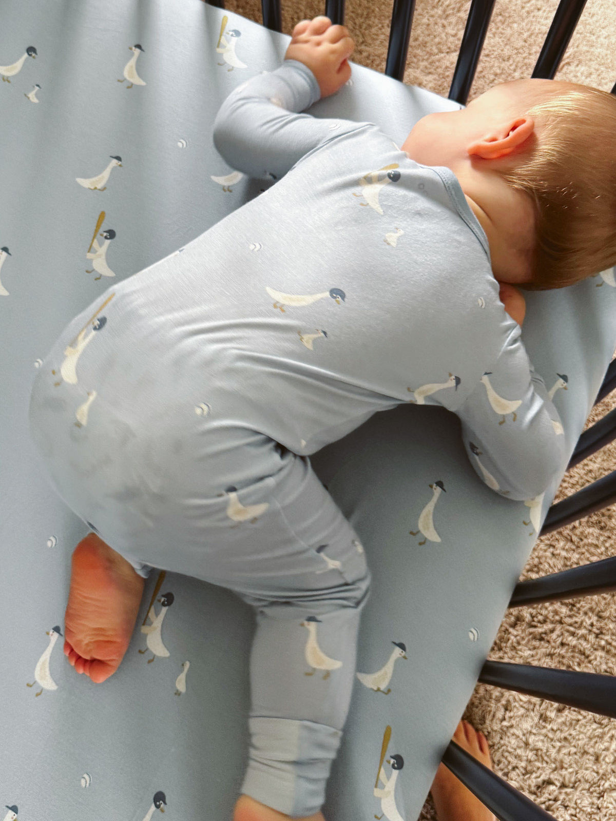 Light blue goose-print convertible baby pajama, long sleeves with covered legs