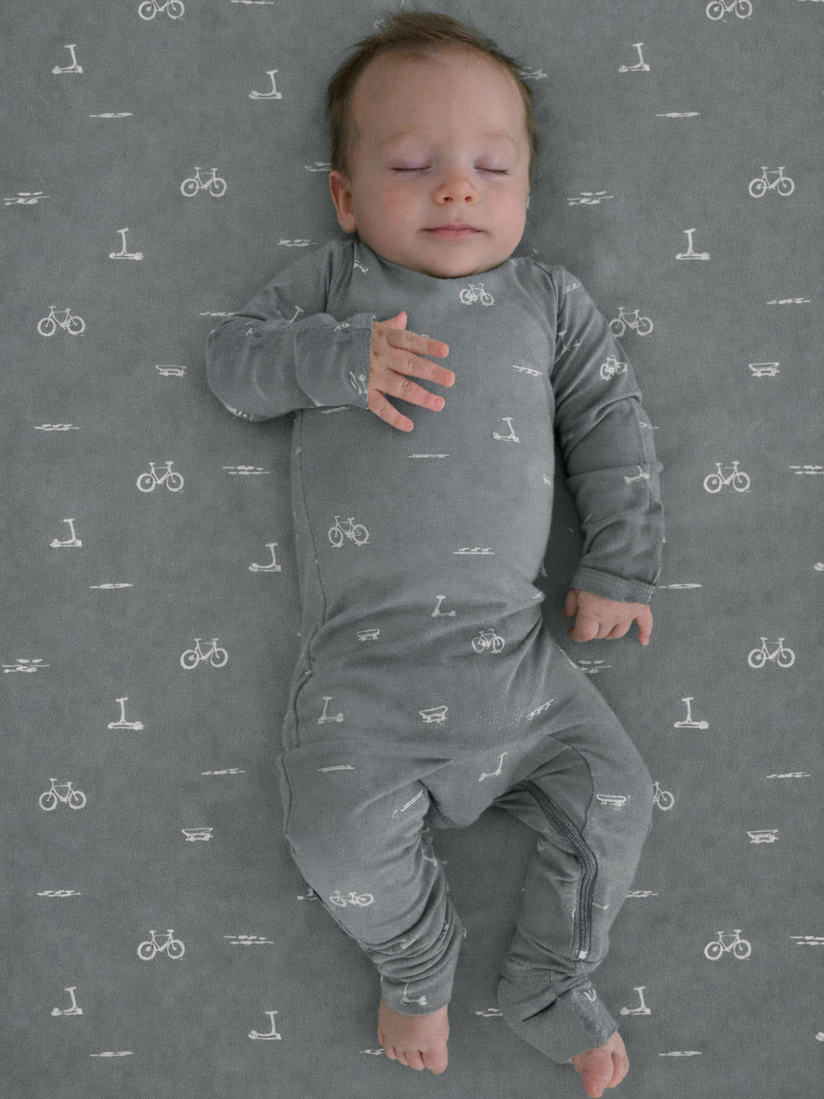 Gray convertible pajamas with Dash icon print; long sleeves and matching pants