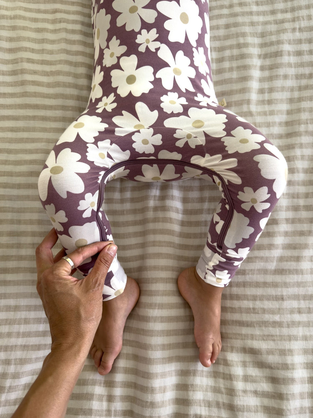 Maroon floral convertible pajamas with cream flowers; open leg/foot area and long sleeves