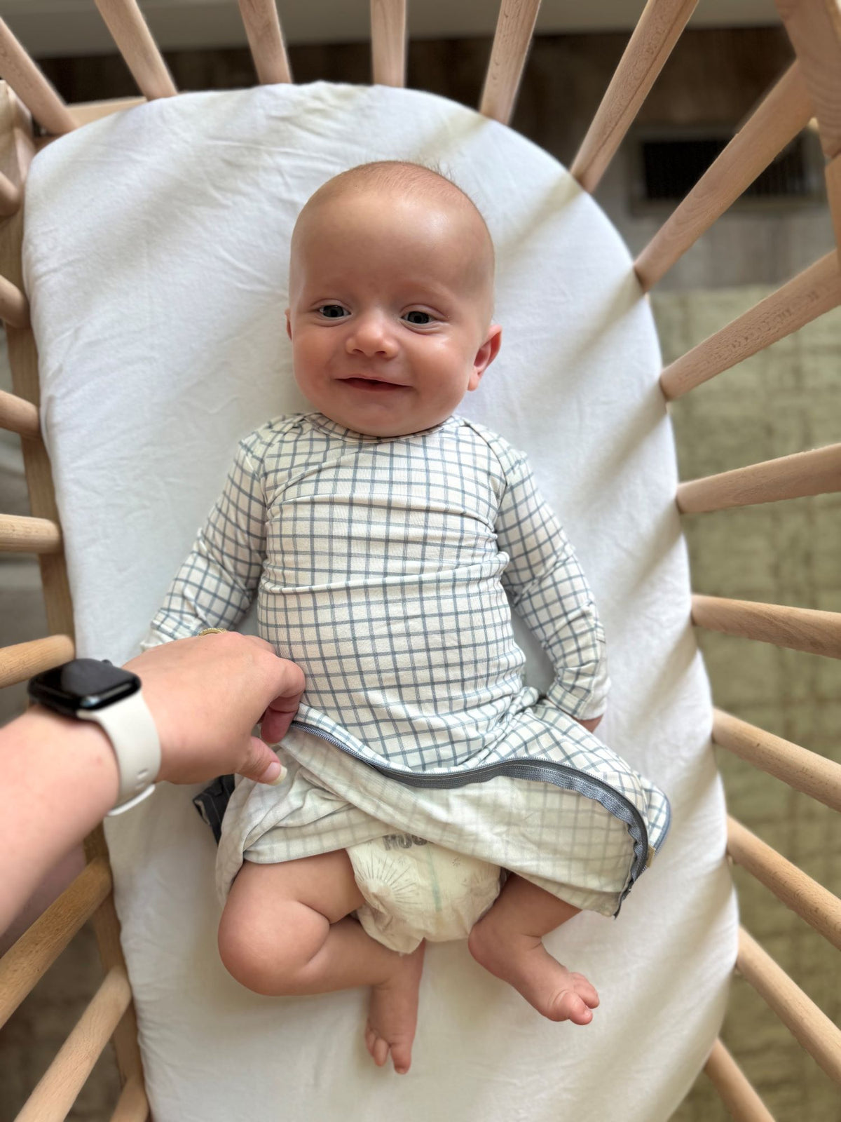 Baby gown with long sleeves and light grid check pattern, wrapped fit