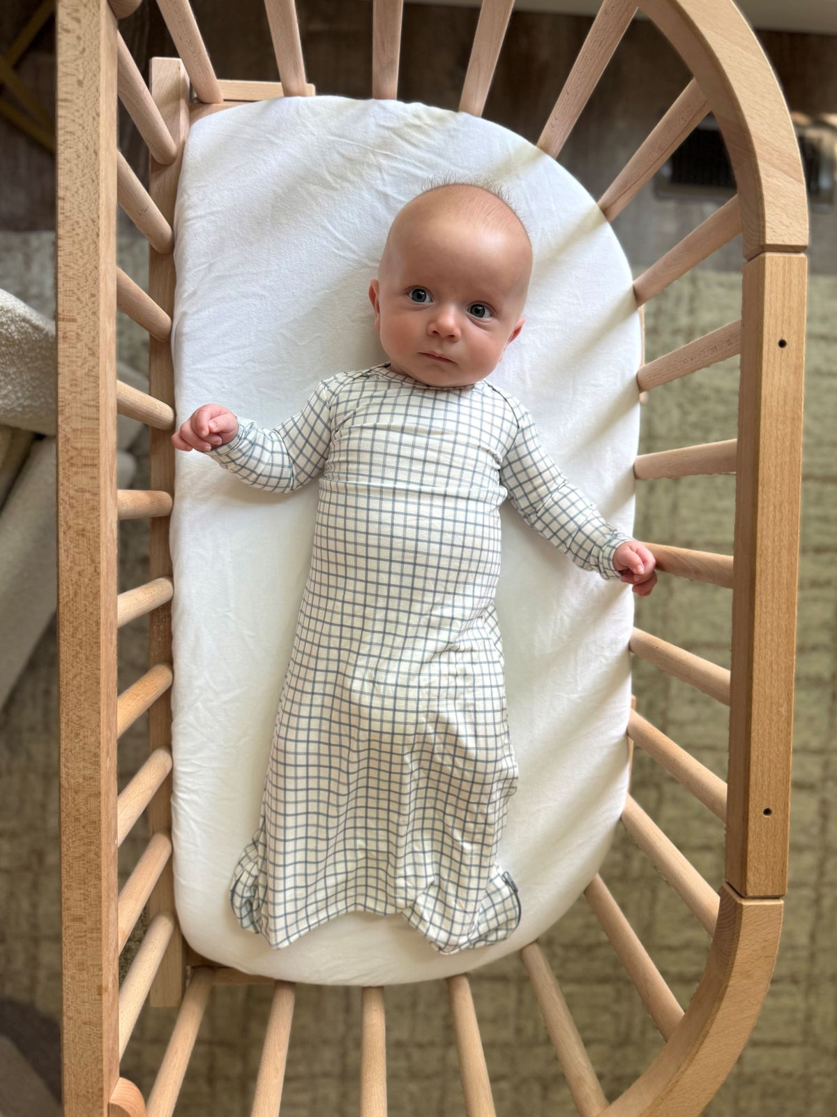 Baby gown with long sleeves and light grid check pattern, wrapped lower section