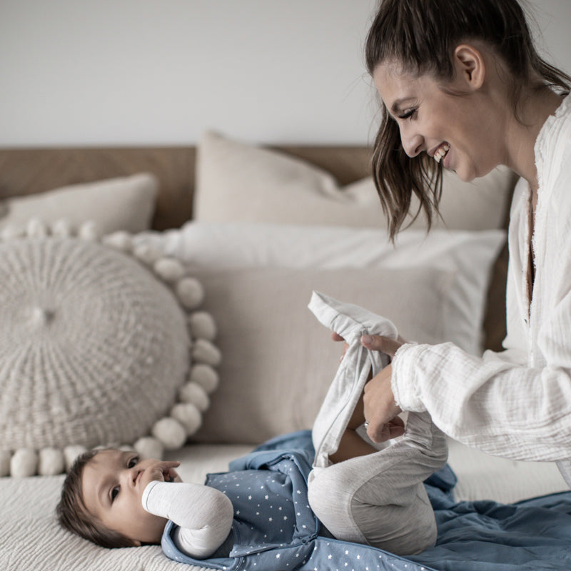 2.5 TOG blue sleep sack with white star print and long gray sleeves