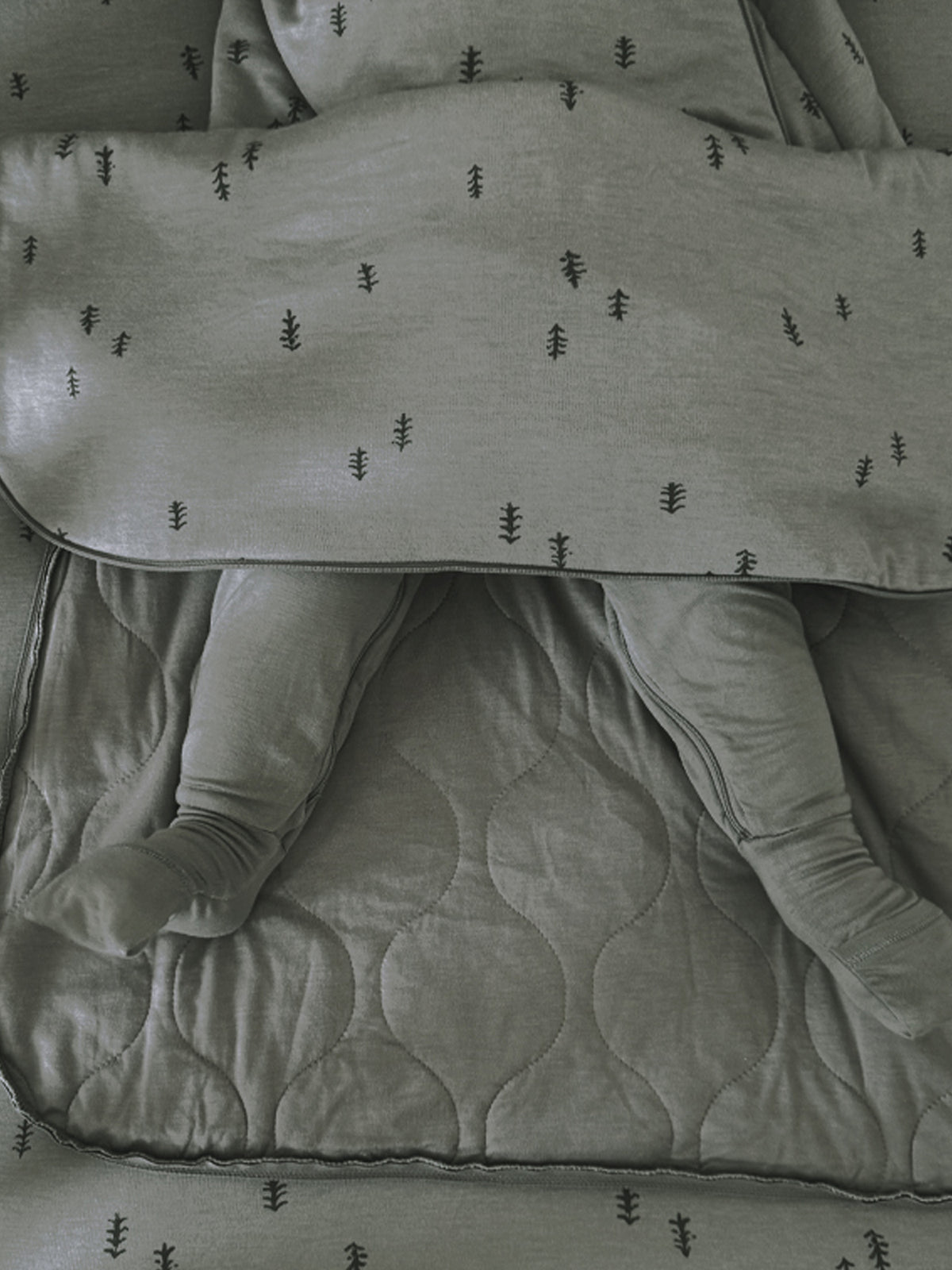 Gray sleep sack with tree print and quilted bottom panel