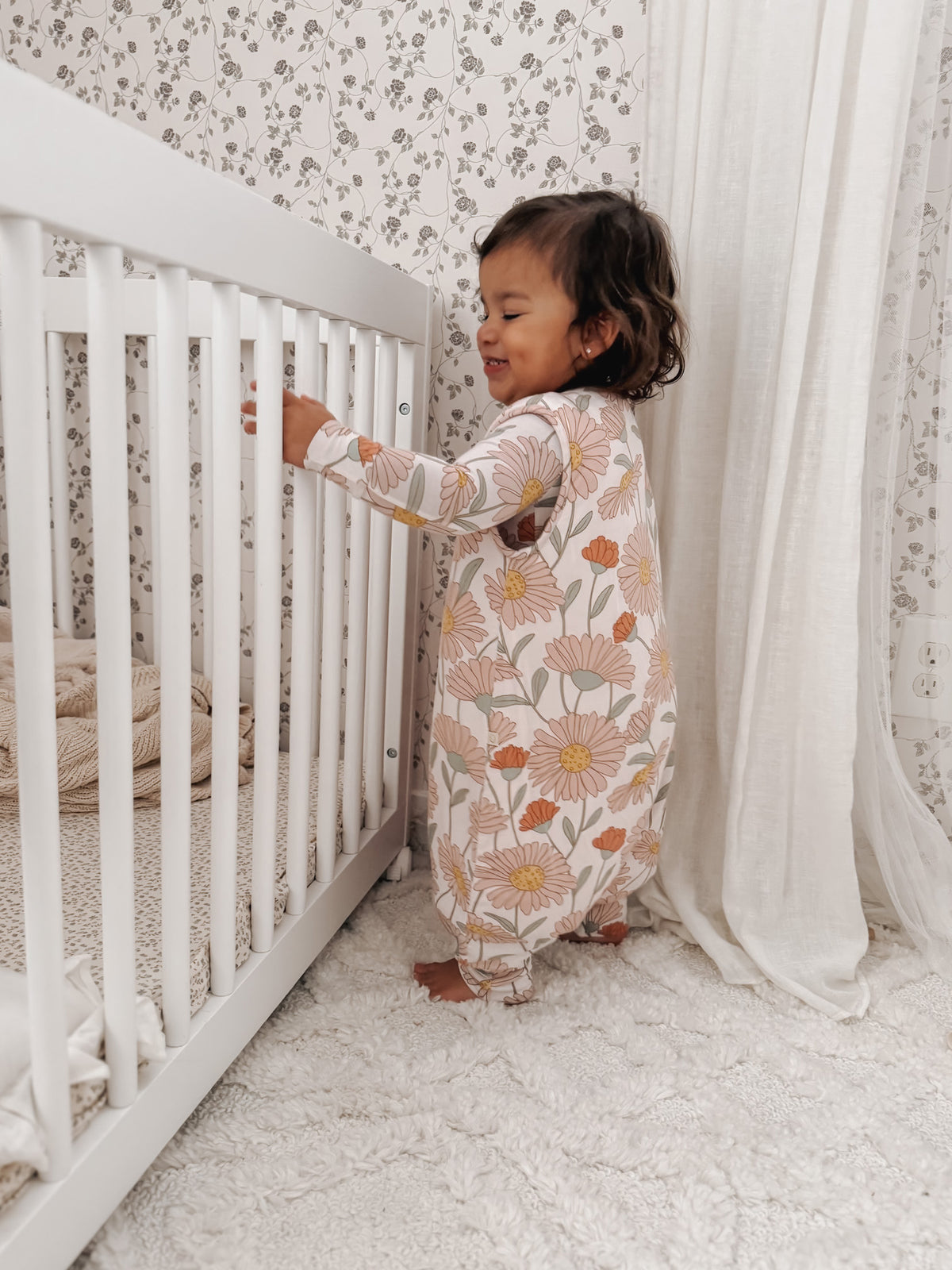 Floral footie sleep sack, full-body coverage with ankle openings and zipper