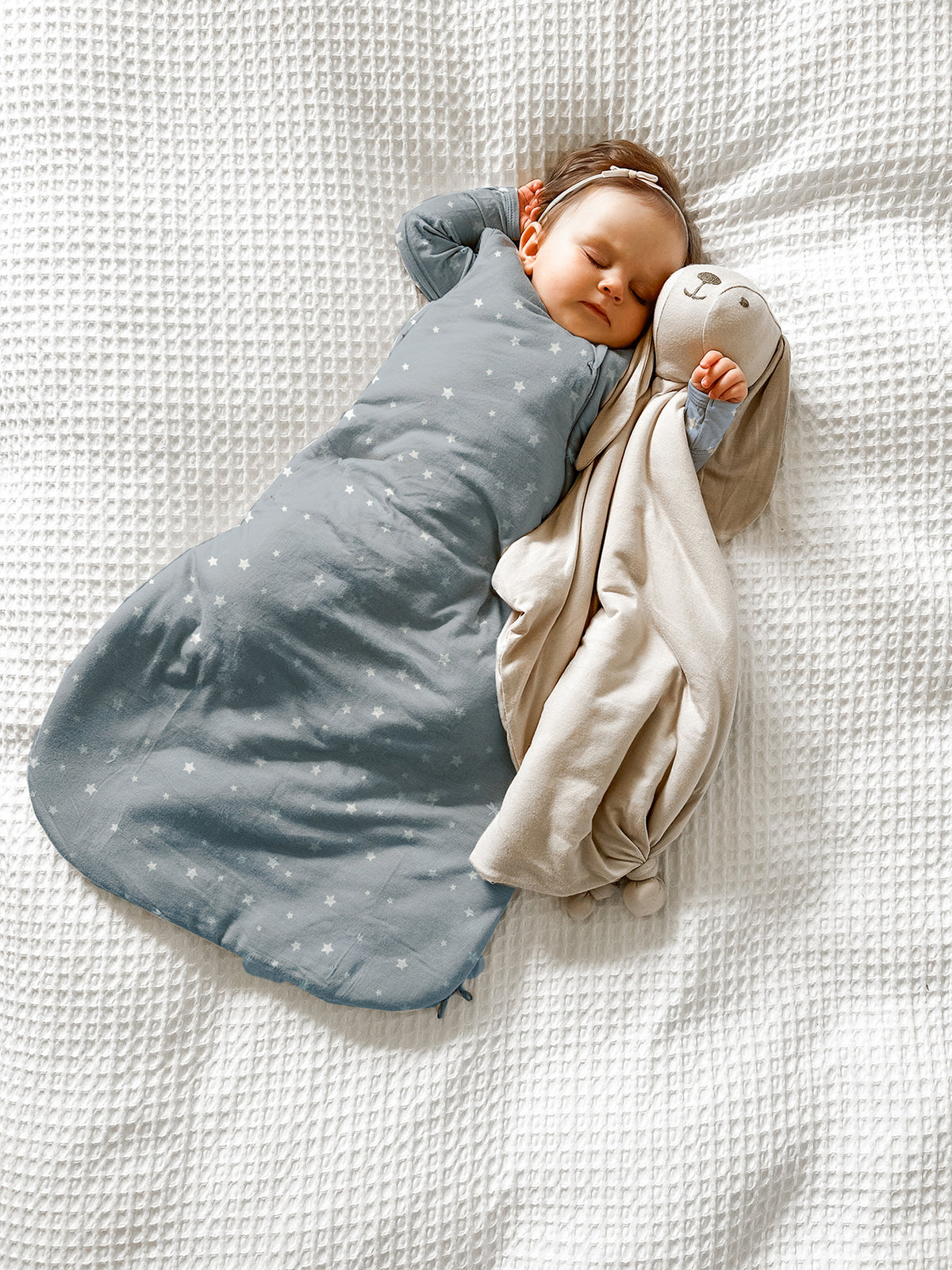 2.5 TOG transitional swaddle sleep sack, light blue with small star pattern