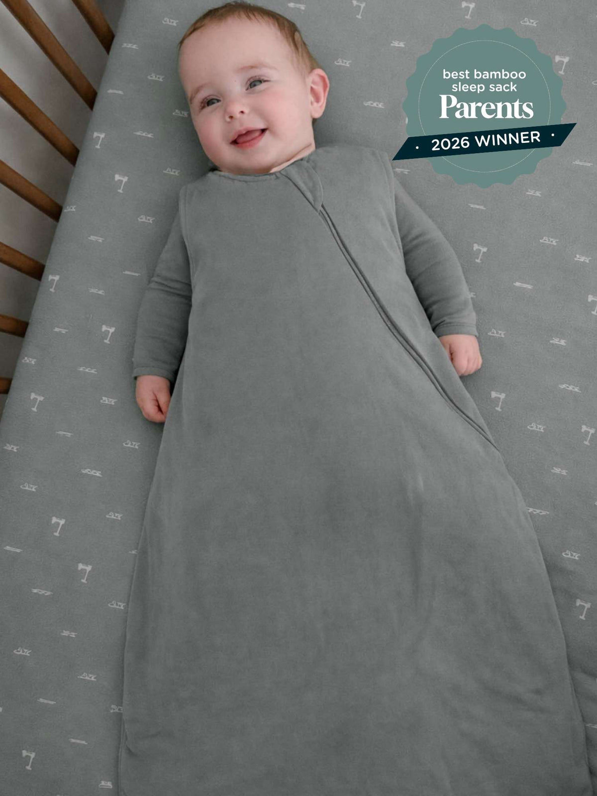 Baby sleep sack in gray with icon pattern, zip-front with diagonal opening