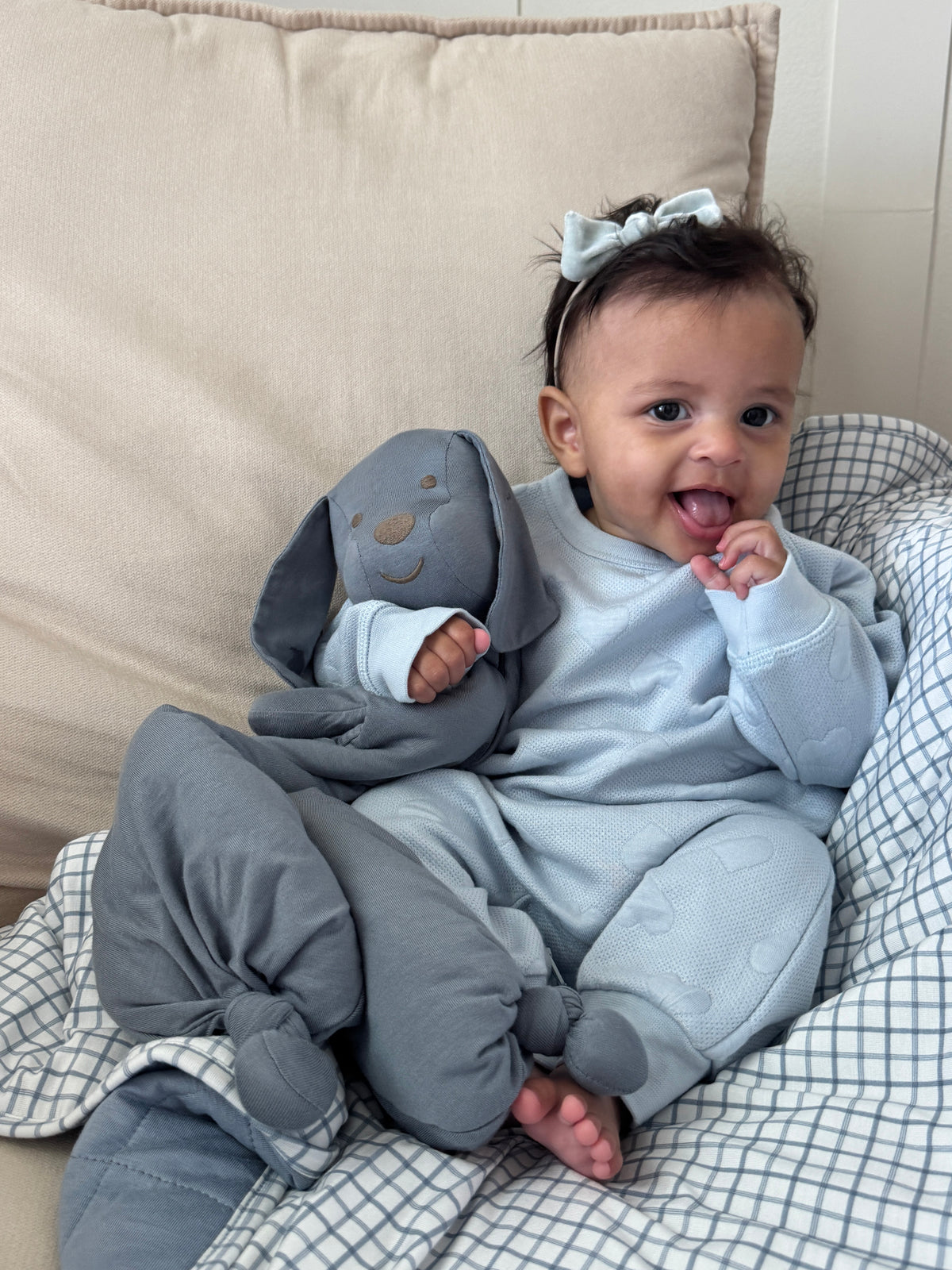 Light blue-gray footed baby jumpsuit with animal-shaped hood and face detail