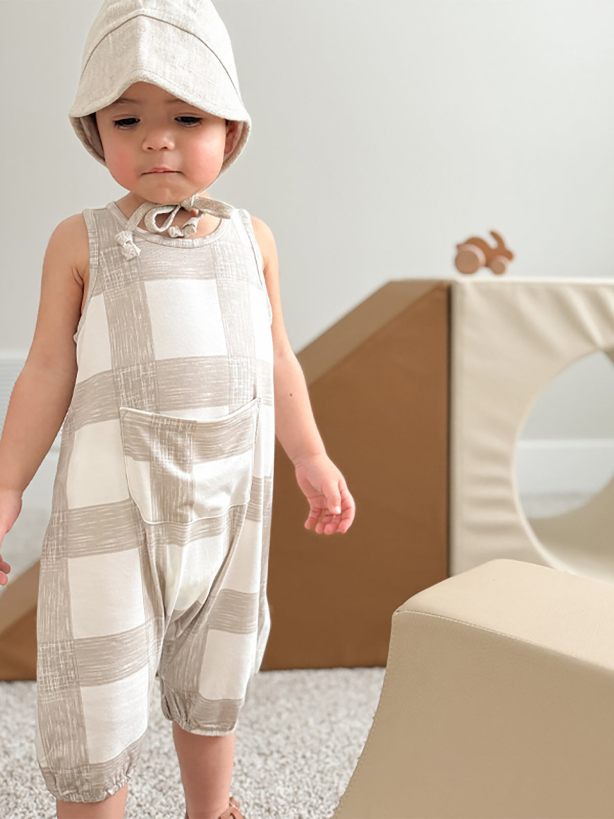 Sleeveless pocket romper, patchwork stripe pattern in light gray and white