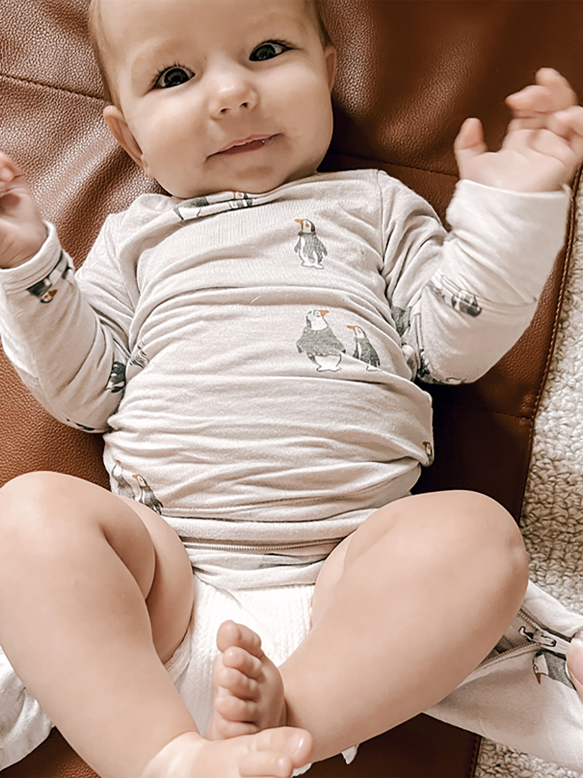Baby gray penguin-print two-piece footie set, long sleeve top and footed bottoms