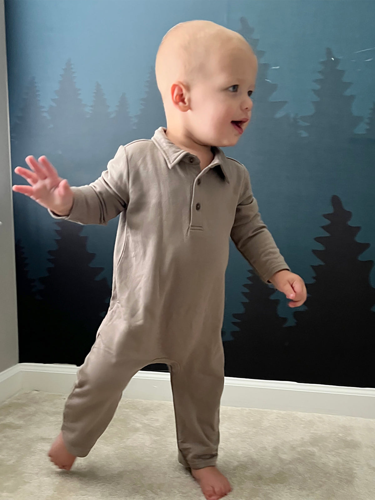 Taupe fleece collared jumpsuit with front buttons and long sleeves