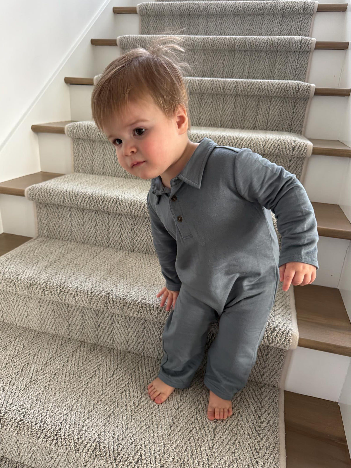 Fleece collared jumpsuit in slate blue with button front and long sleeves