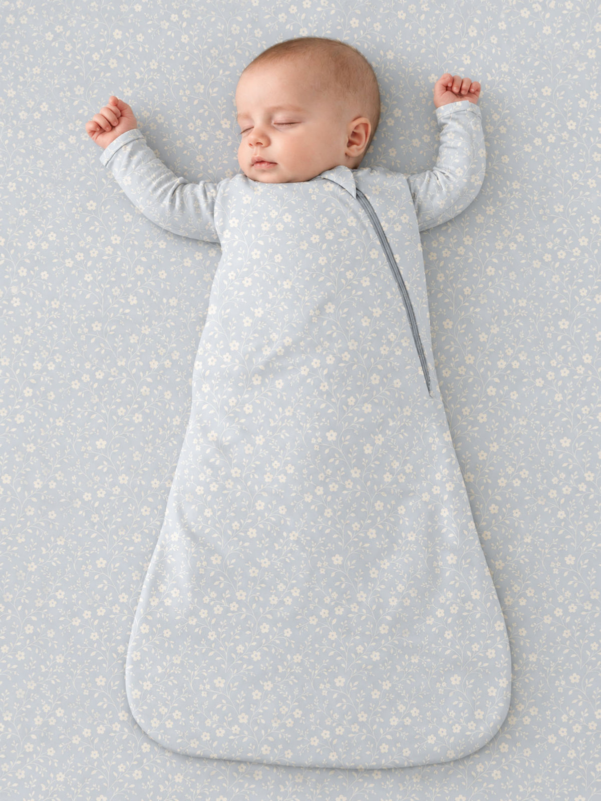 Light blue floral 1.0 TOG sleep sack with long sleeves and front zipper