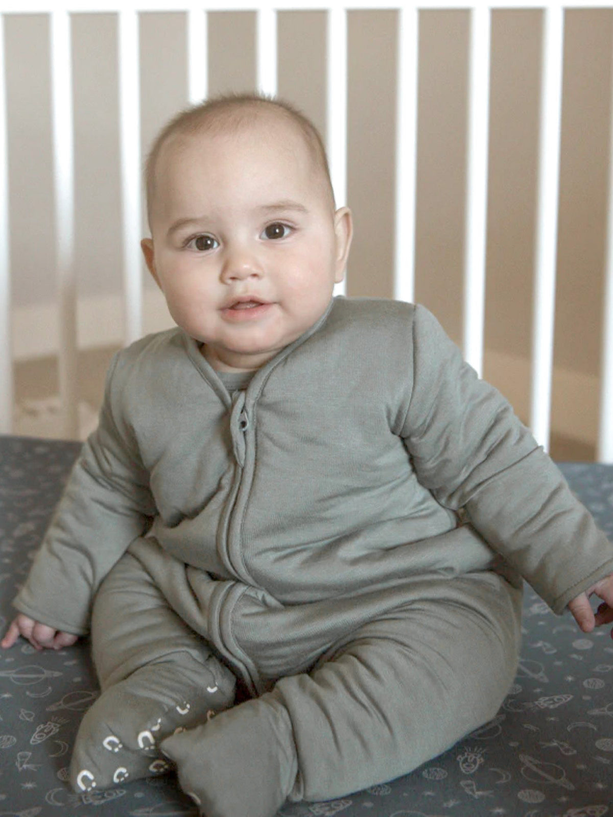 Sage green long-sleeve footie sleep sack, front zipper, cuffed sleeves and legs